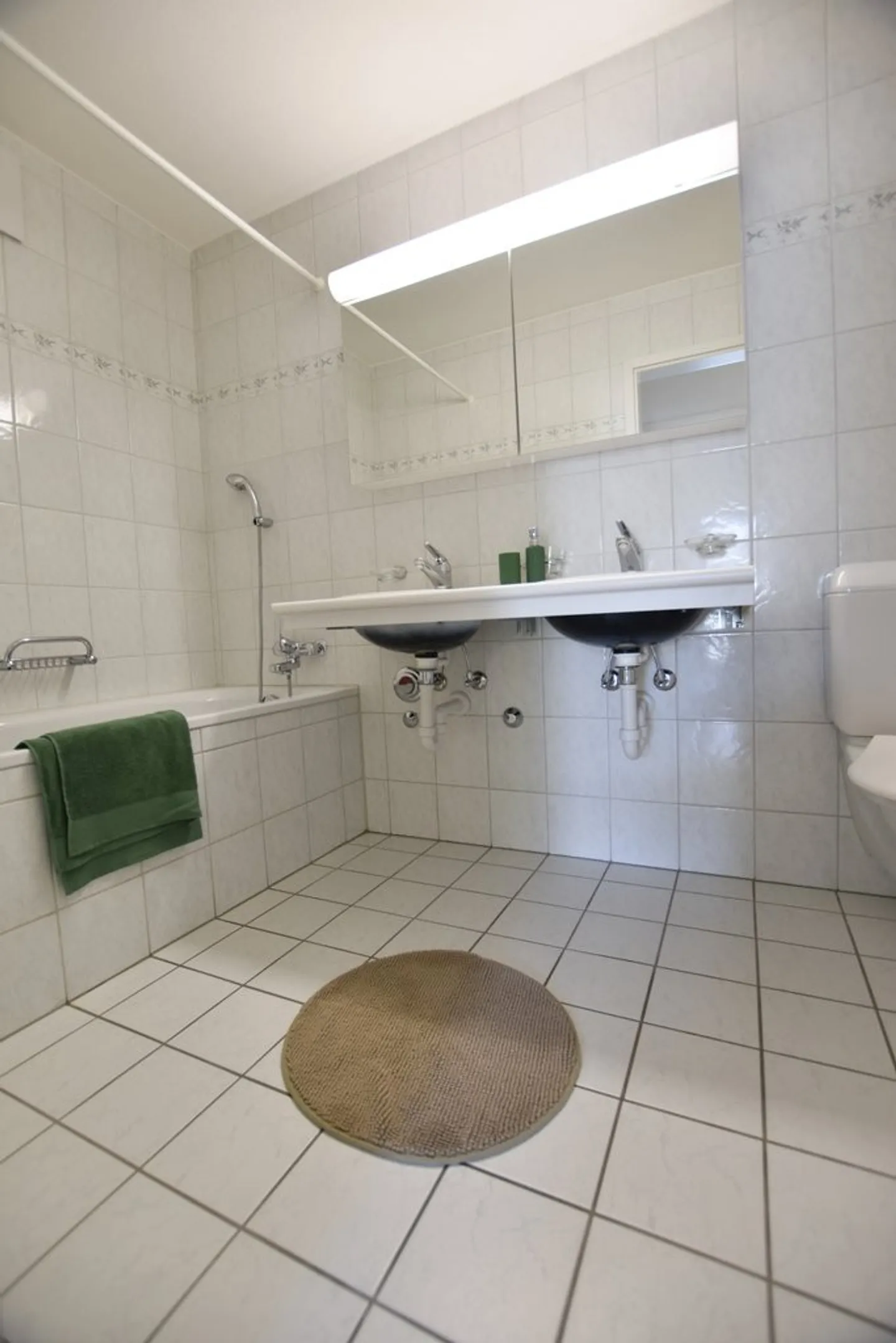 4.5-Zimmerwohnung mit Gartensitzplatz und eigener Waschküche - Foto 7 von 12