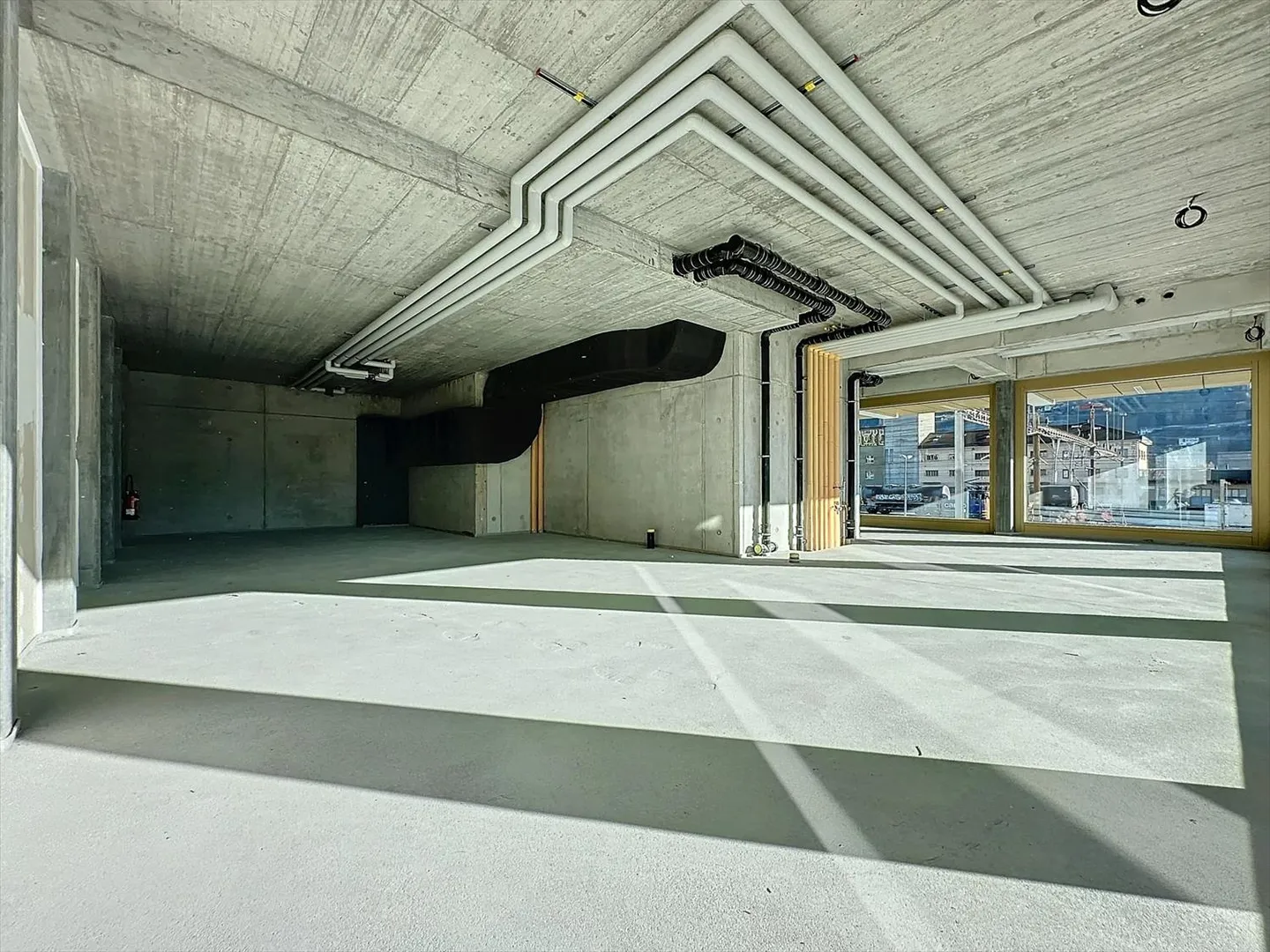 Superba arcade commerciale di 171,46 m2 in affitto nel nuovo quartiere Cour de Gare a Sion - Foto 1 di 5