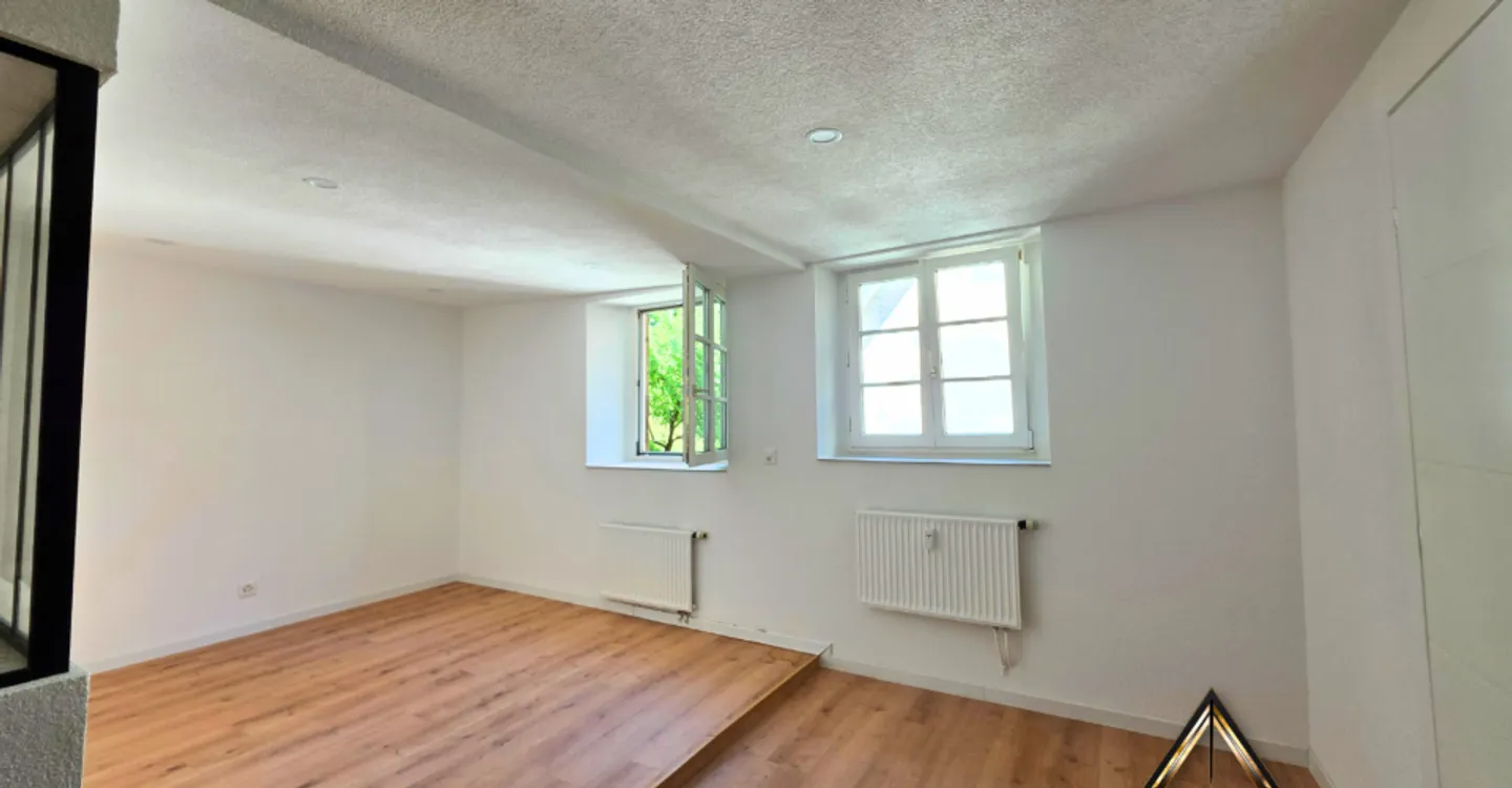 Charmant Appartement Rénové - Photo 3 sur 9