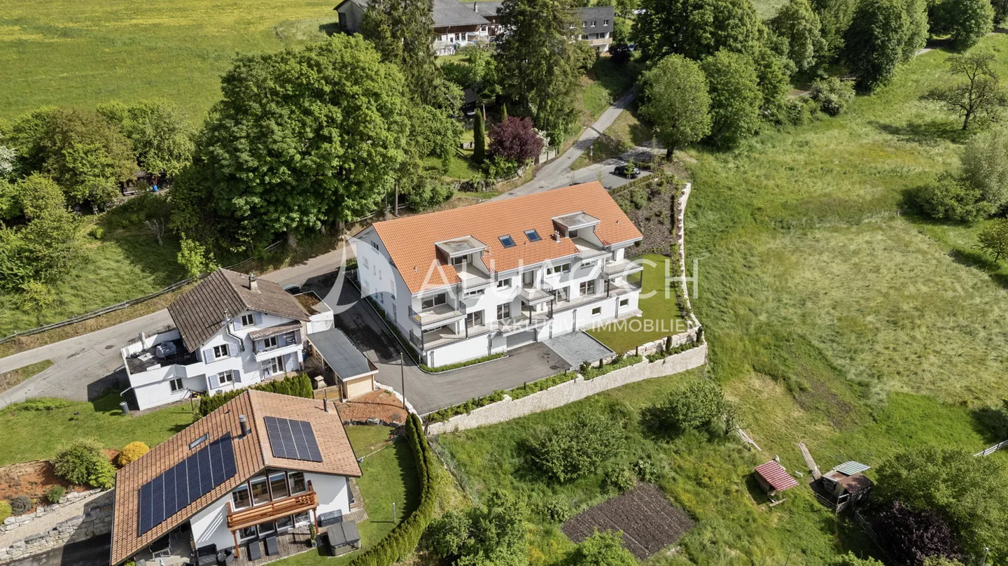 Modernes Mehrfamilienhaus in Tramelan - Foto 4 von 17