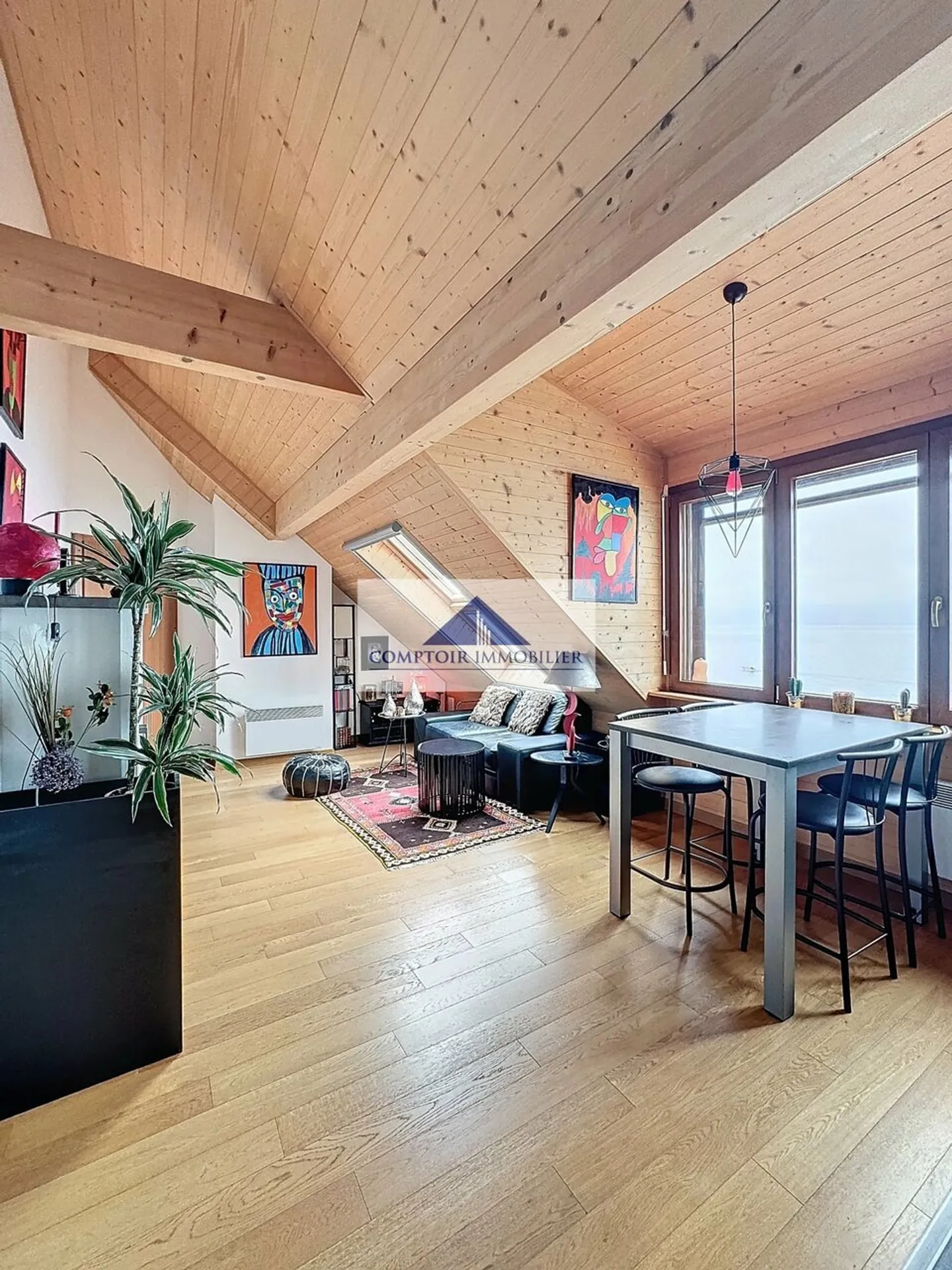 2,5 Zimmer im Dachgeschoss mit Blick auf den See - Foto 1 von 11