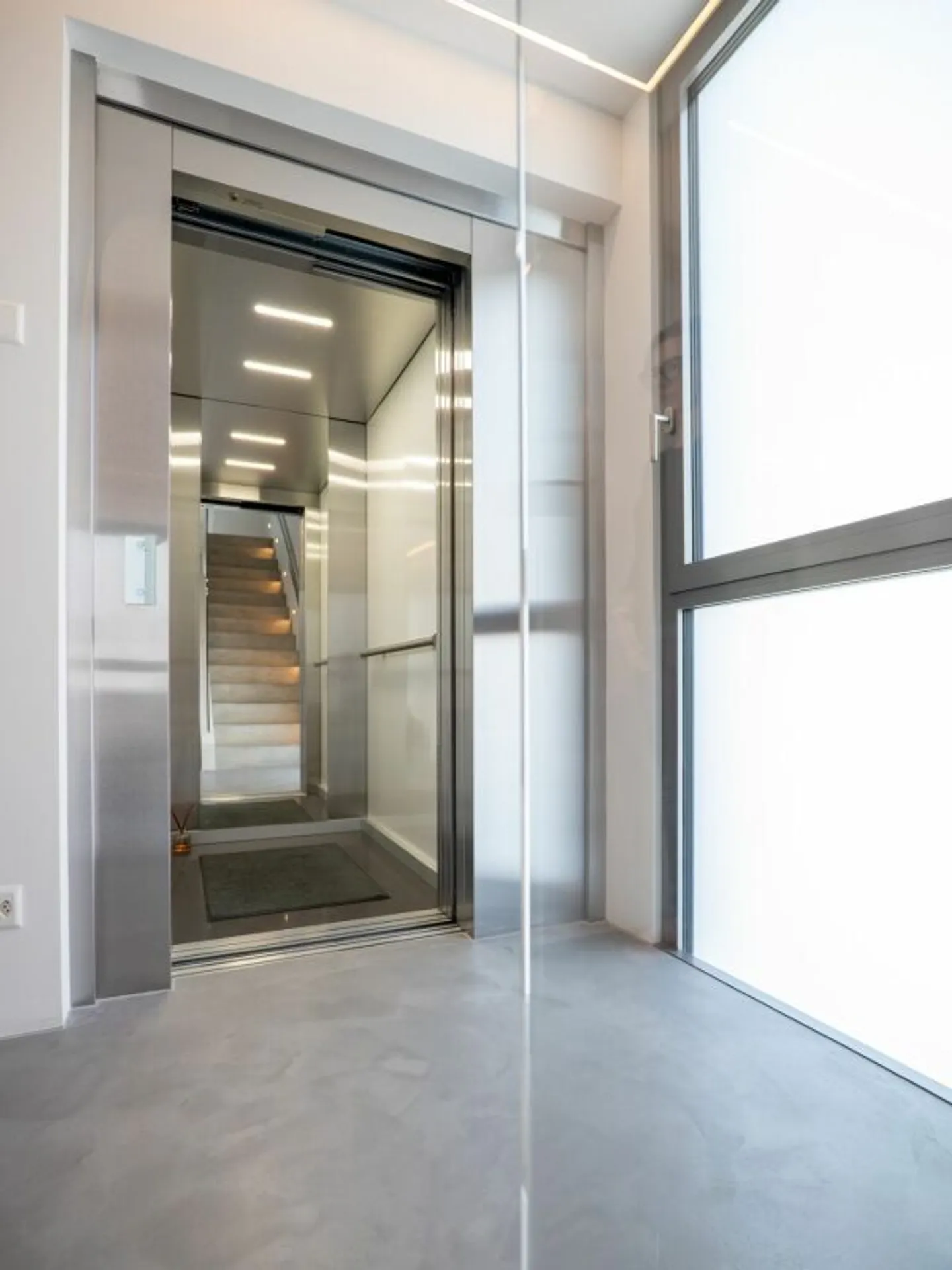 IN VENDITA A MINUSIO - moderna villa bifamiliare con vista lago - Foto 25 di 34