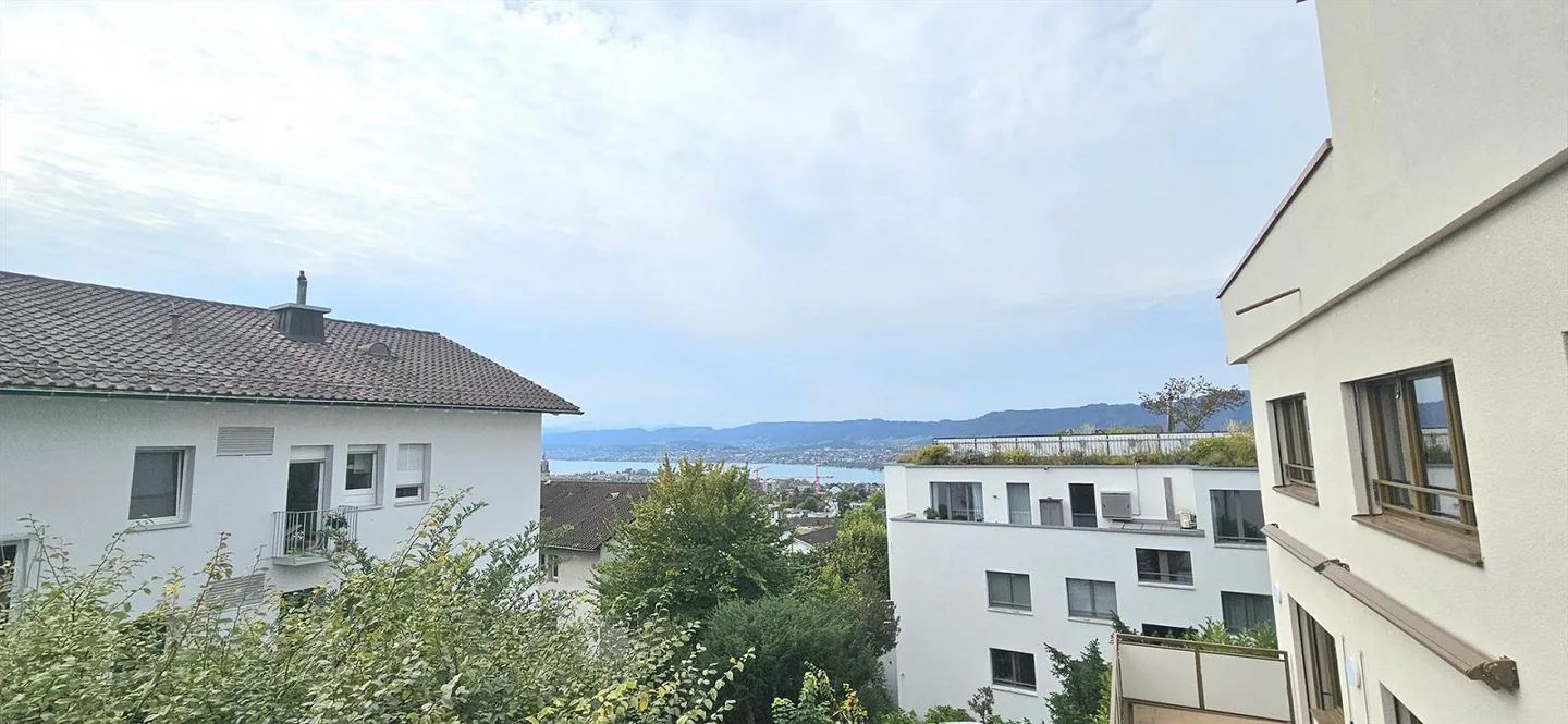 Charmante Wohnung mit Seesicht - Foto 1 von 12