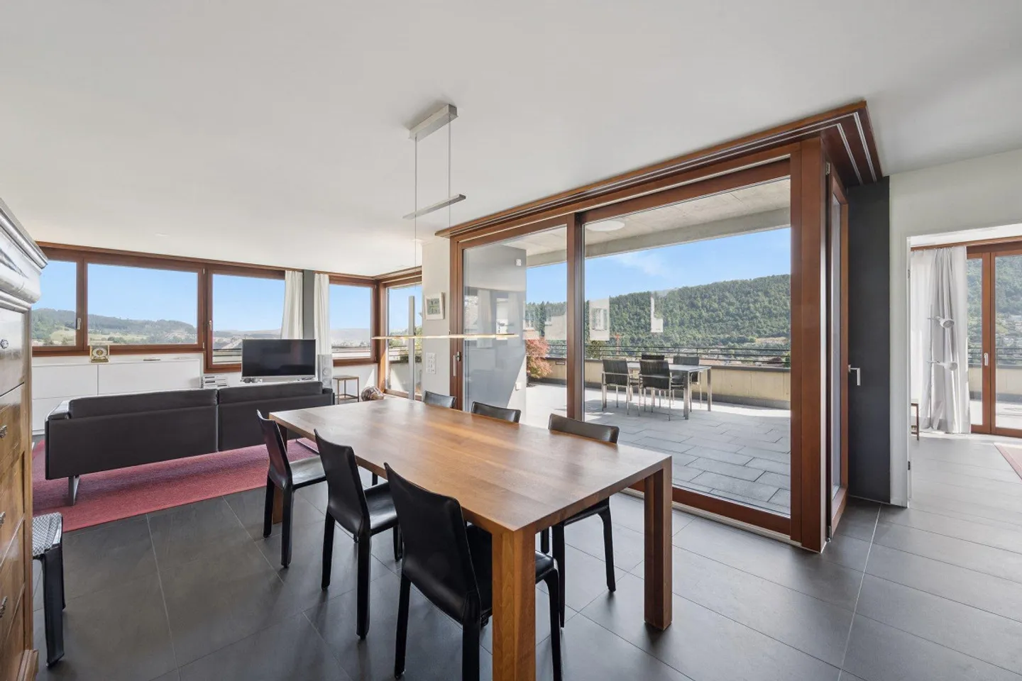 Above the Rooftops: Penthouse with a View - Photo 1 of 17