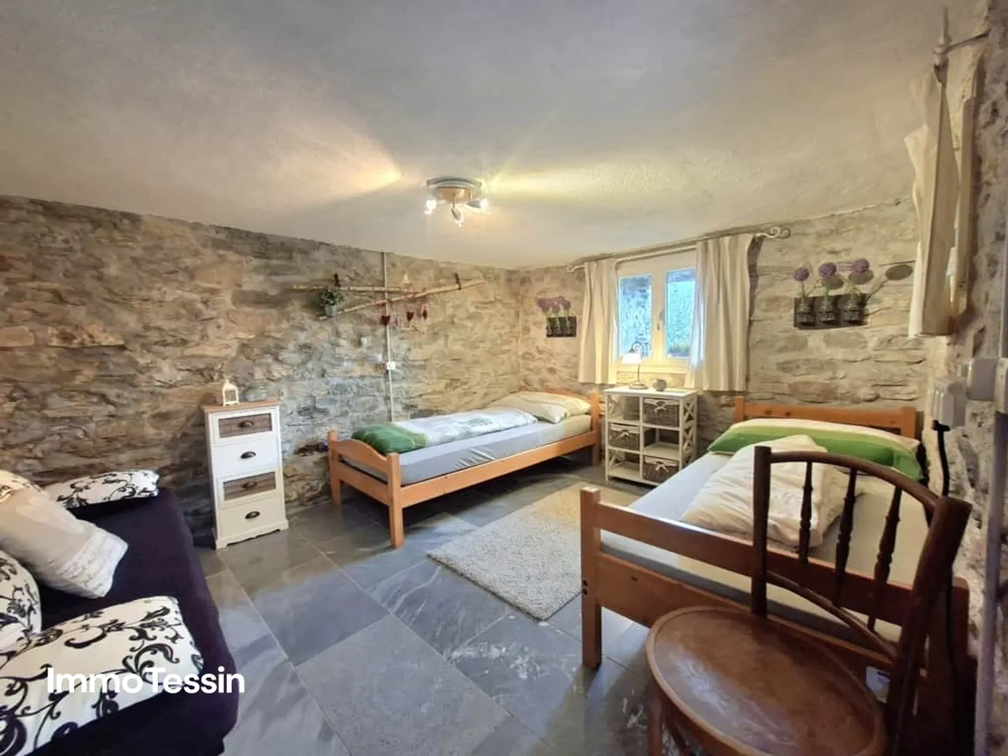 Charming and stylishly renovated dream rustic with a view of the Verzasca dam and 5800 m2 of natural land - Photo 10 of 13