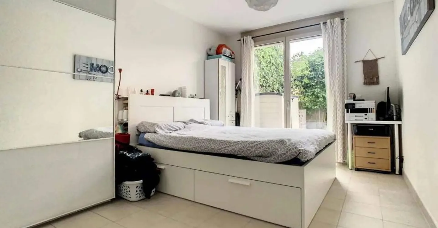 Appartement Charmant avec Jardin - Photo 7 sur 8