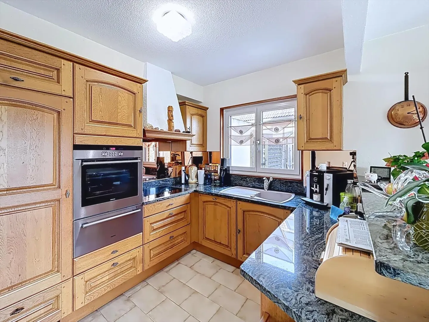 Semi-detached villa with 5.5 rooms on the heights of Boudry - Photo 3 of 11