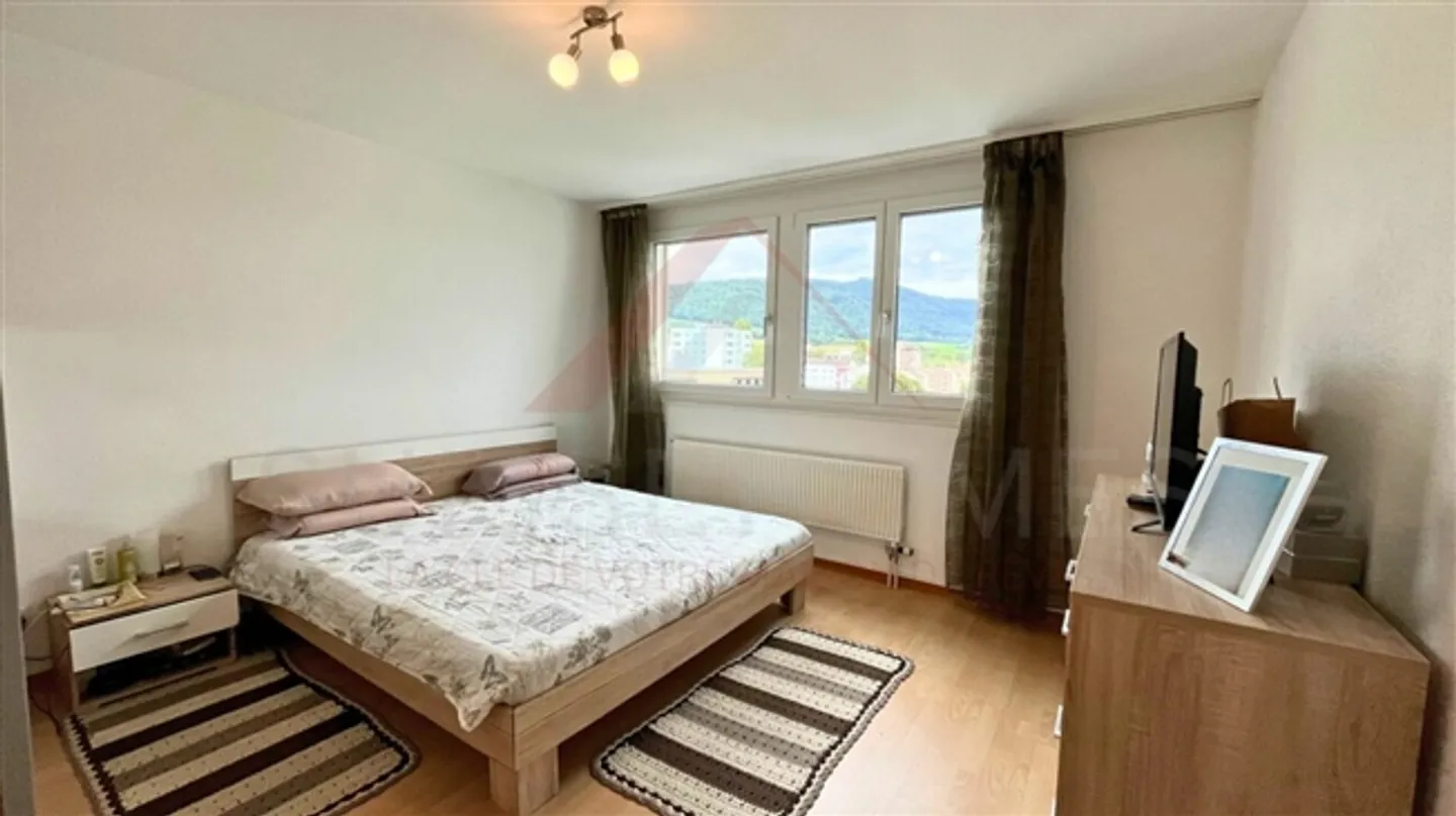 Rare bright 3.5 room apartment in Delémont of 85 m² with terrace and panoramic view - Photo 11 of 16