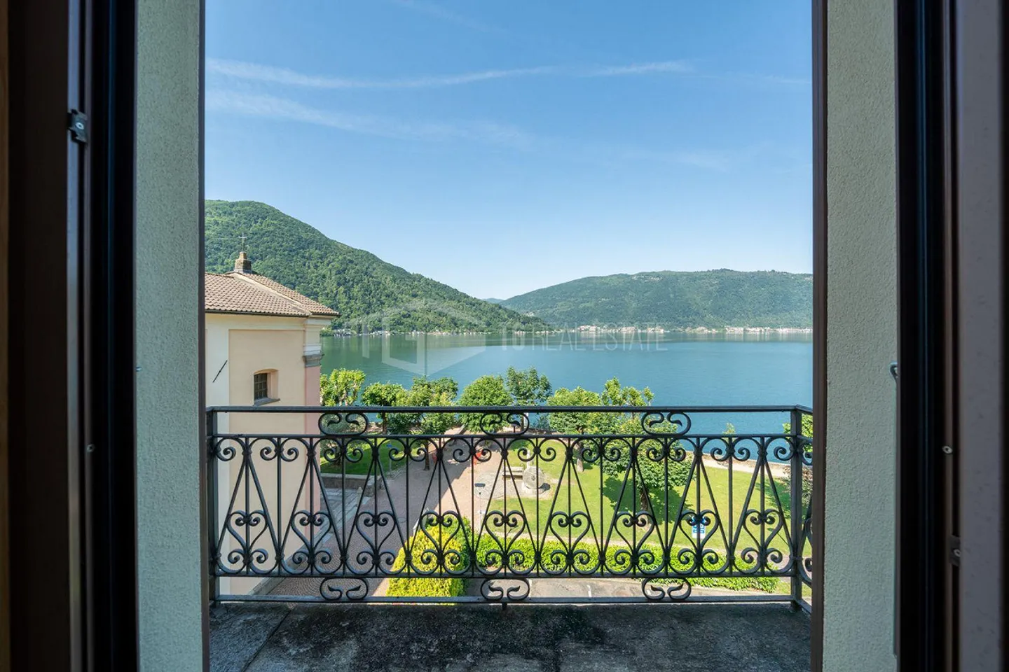 PENTHOUSE WITH LAKE VIEW IN ELEGANT HISTORICAL COMPLEX - Photo 1 of 13