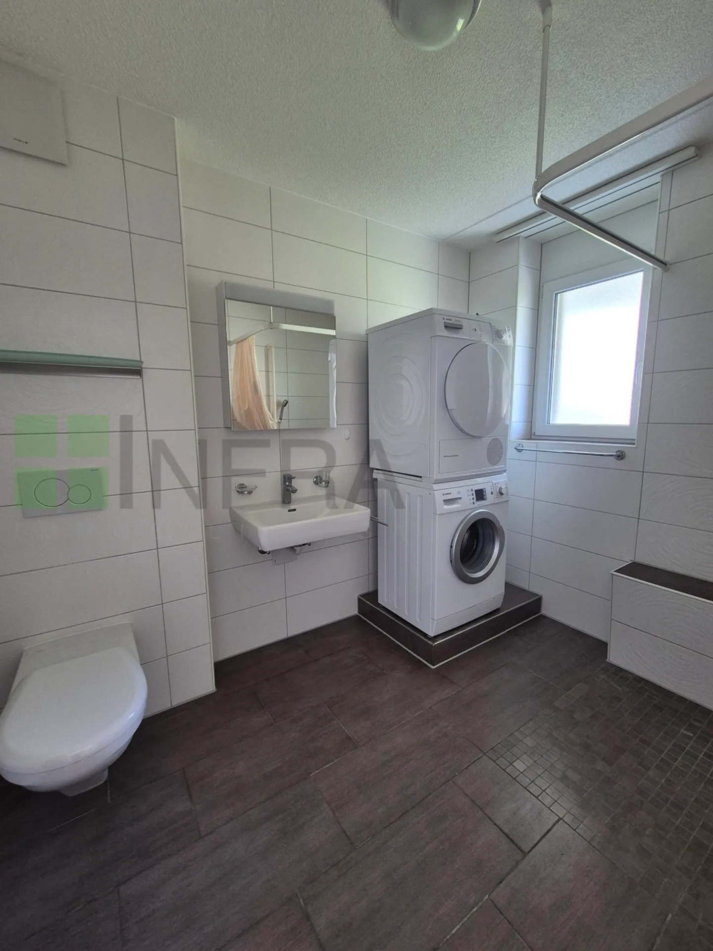 Appartement de 65 m2 au rez-de-chaussée comprenant : Un hall Une cuisine ouverte - Photo 3 sur 7