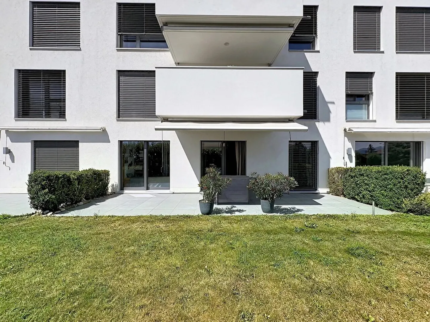 Appartamento di 2.5 locali con veranda e giardino privato a Saint-Sulpice - Foto 8 di 9