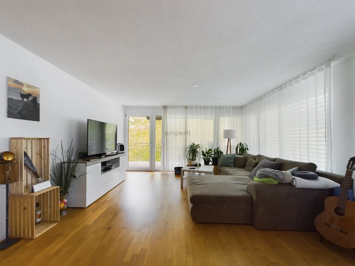 Appartamento 3.5 stanze centrale e tranquillo con vista privata sul verde - Foto 1 di 12