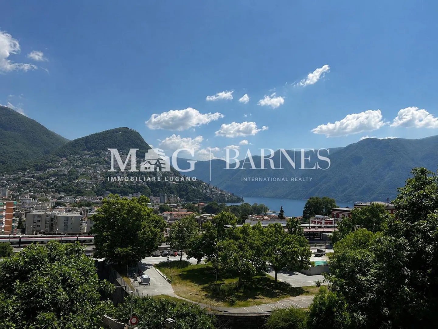 Lugano: Zentrale 2,5-Zimmer-Wohnung mit Balkon und Garage - Foto 1 von 6