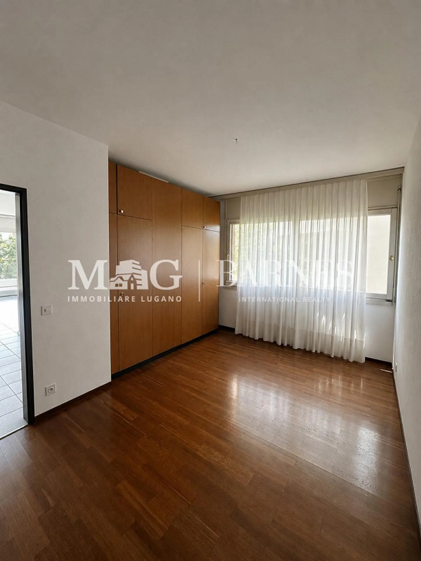 Lugano: Zentrale 2,5-Zimmer-Wohnung mit Balkon und Garage - Foto 5 von 6