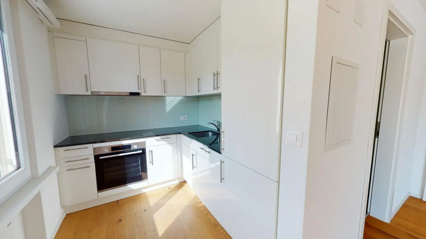 Appartement moderne 2.5 pièces avec grande terrasse - Photo 2 sur 6