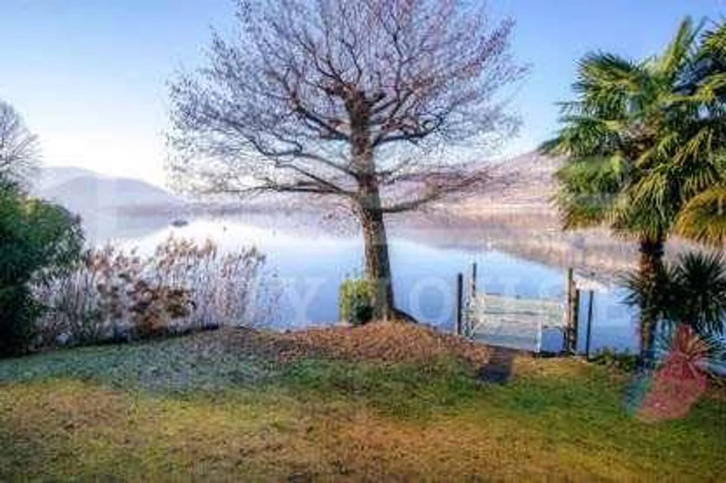 PENTHOUSE RAFFINATO CON TERRAZZA SUL TETTO E VISTA SUL LAGO - Foto 8 di 9
