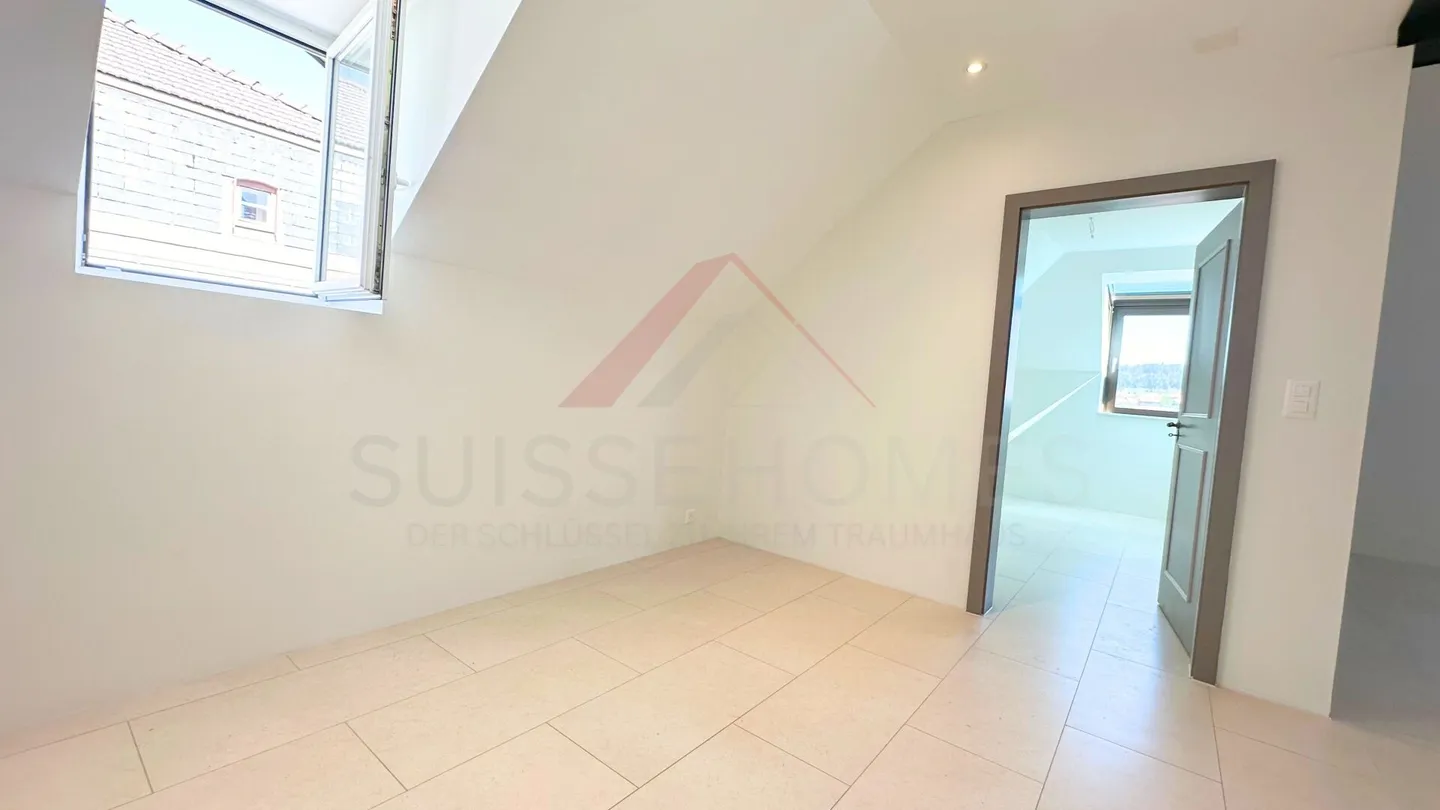 Renovated duplex of 200 m² on the top floor of a mansion - comfort and charm in La Chaux-de-Fonds - Photo 6 of 13