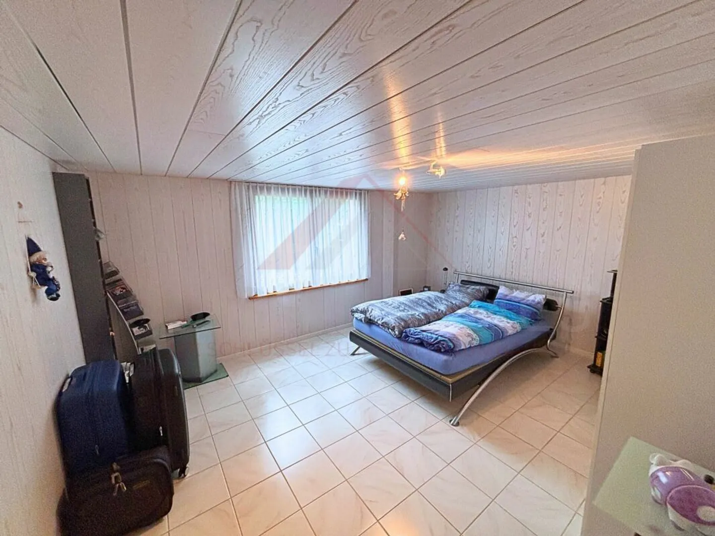 Une maison avec cœur, histoire et espace de vie - Votre oasis familiale à Worben - Photo 7 sur 16