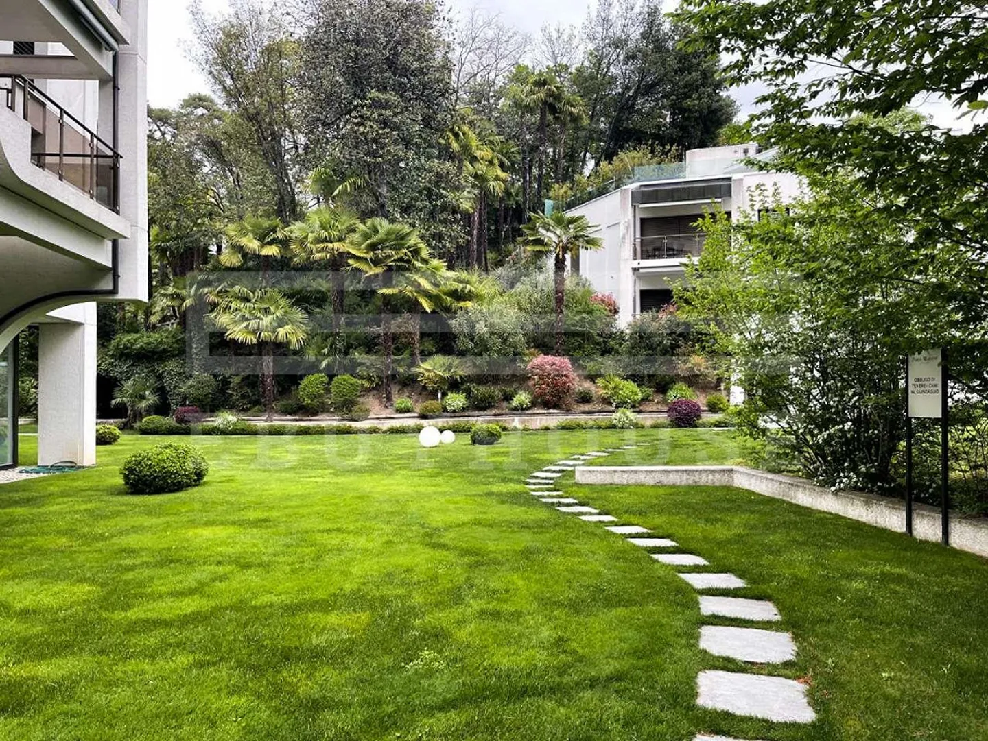 PENTHOUSE SURROUNDED BY GREENERY WITH LAKE VIEW - Photo 1 of 13