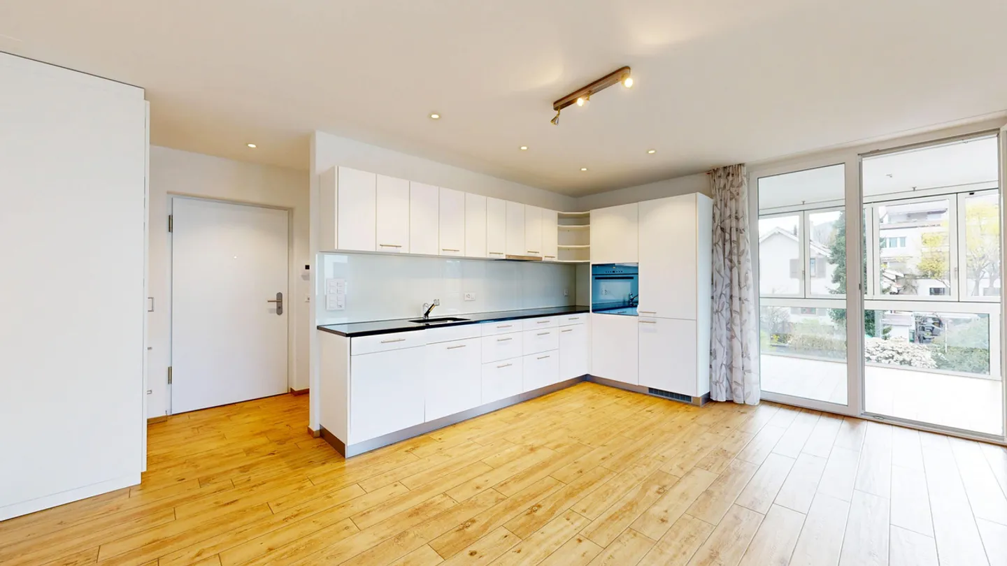 Modern 2.5-room apartment with winter garden and carport - Photo 2 of 9