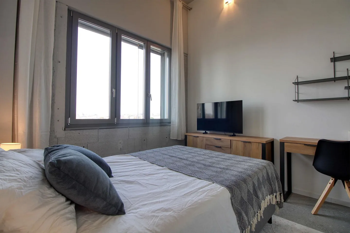 Coliving moderno che unisce intimità, lavoro e vita condivisa a Renens - Foto 1 di 30