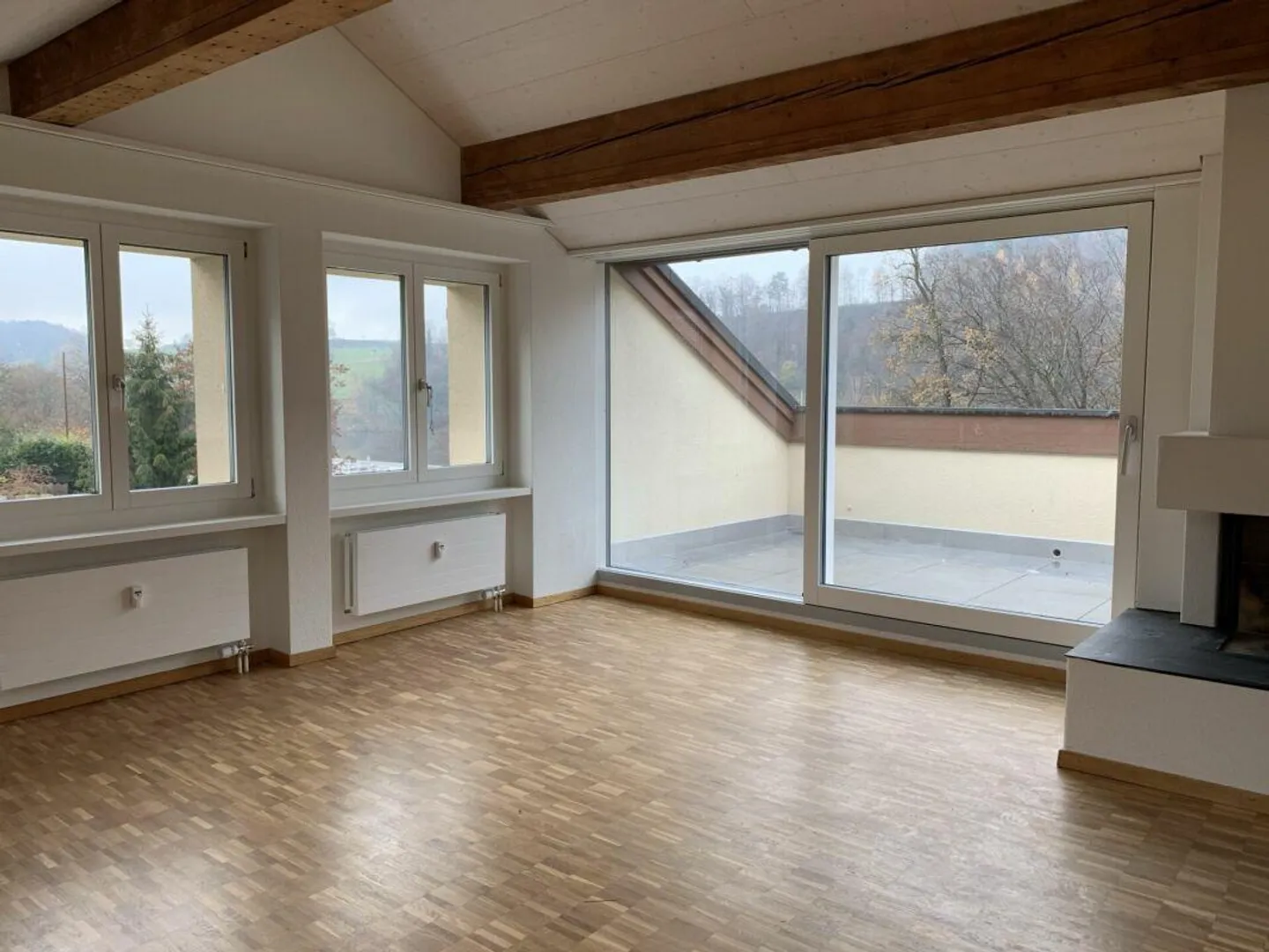 Charmante Dachwohnung am Rotsee - Foto 1 von 10