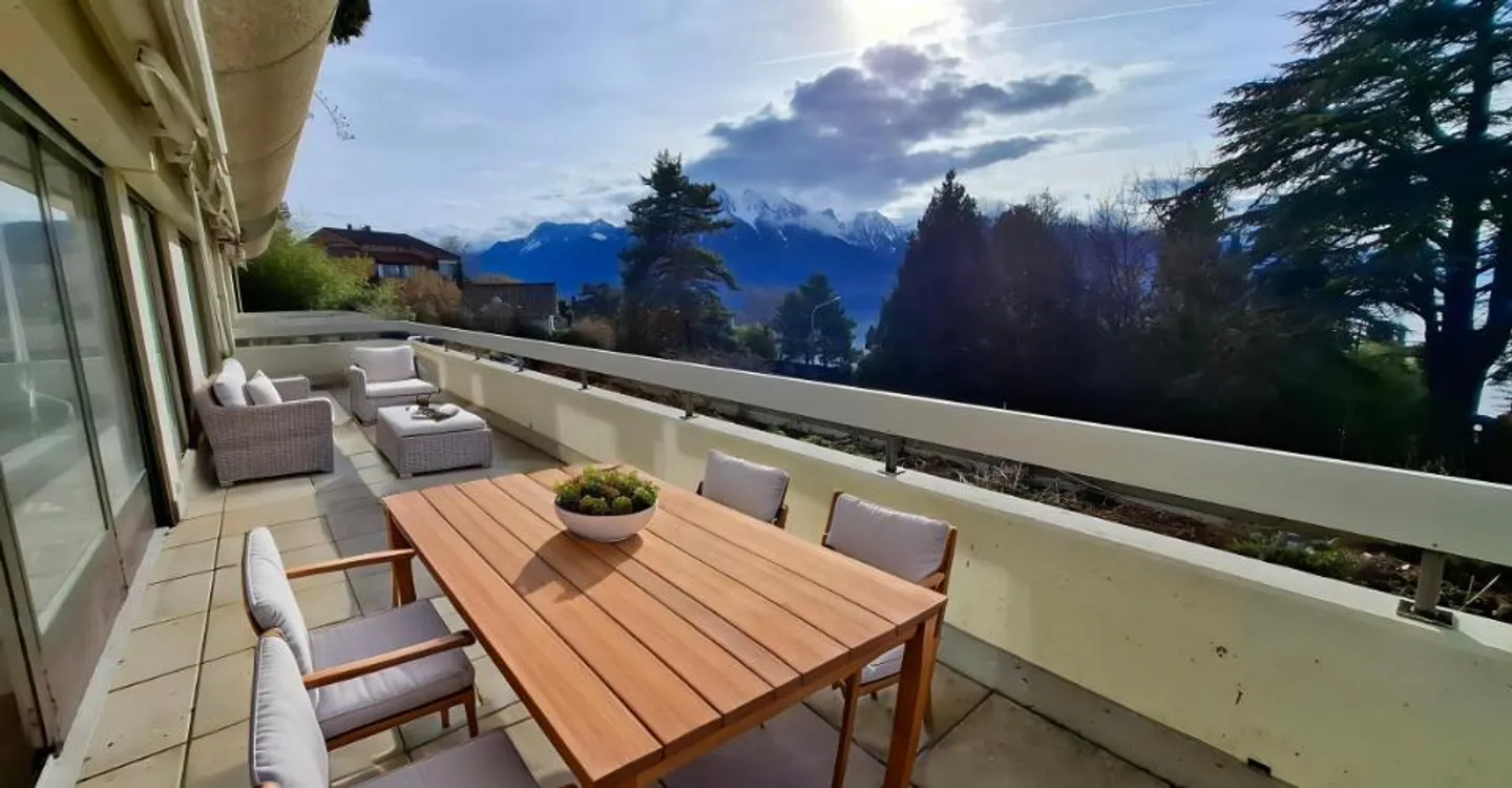 Appartement Charmant avec Vue sur le Lac - Photo 8 sur 13
