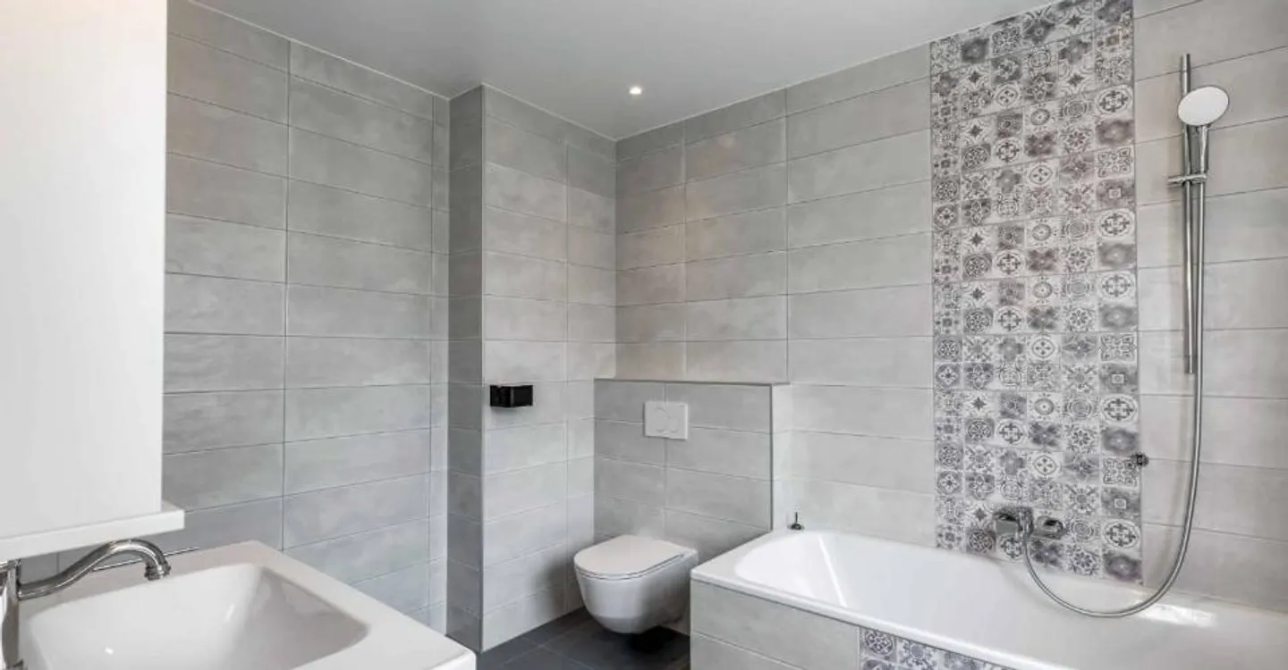 Geräumige Wohnung mit Garten - Foto 7 von 7