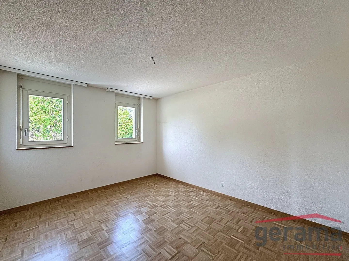 Appartement 3.5 pièces au 1er - Photo 3 sur 8