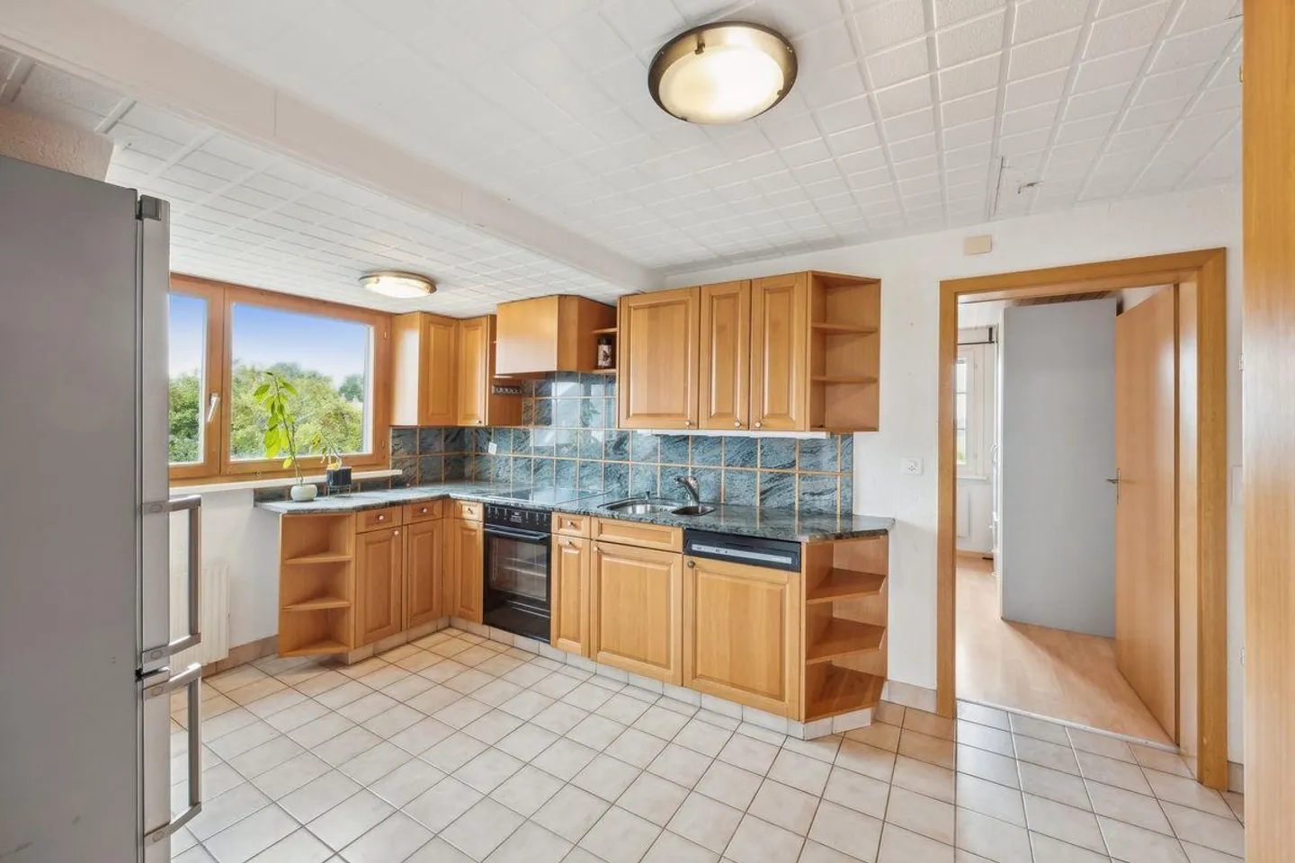 Affascinante casa residenziale con due appartamenti e grande giardino - Foto 11 di 13