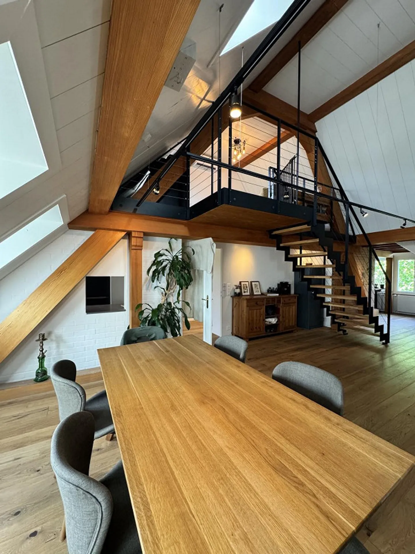 Vie de type loft au-dessus des toits de la ville - Photo 1 sur 13