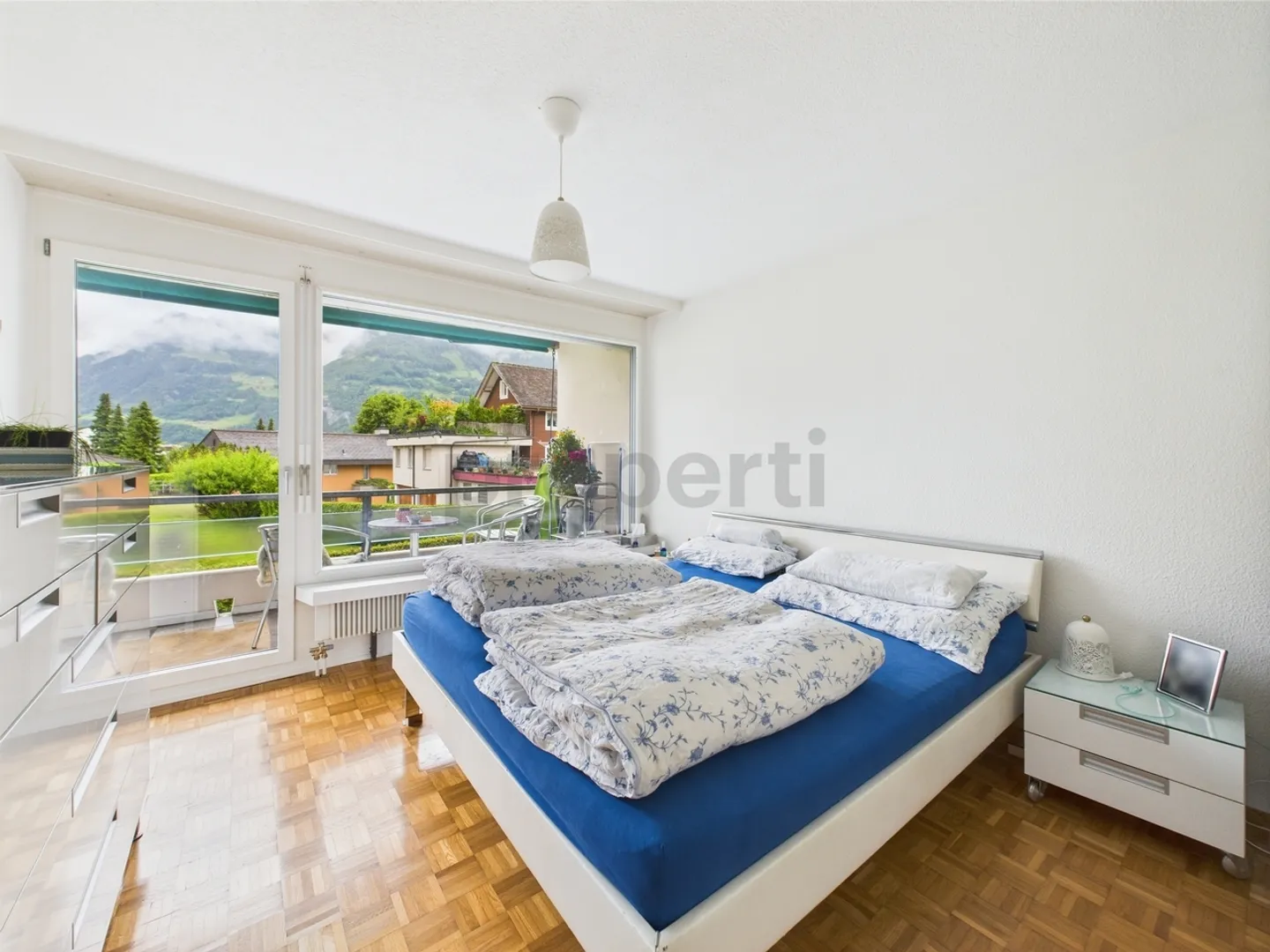 Attraktive Kapitalanlage mit Mieter - 3.5 Zimmer Wohnung mit Bergblick &amp; Garagebox - Foto 5 von 12