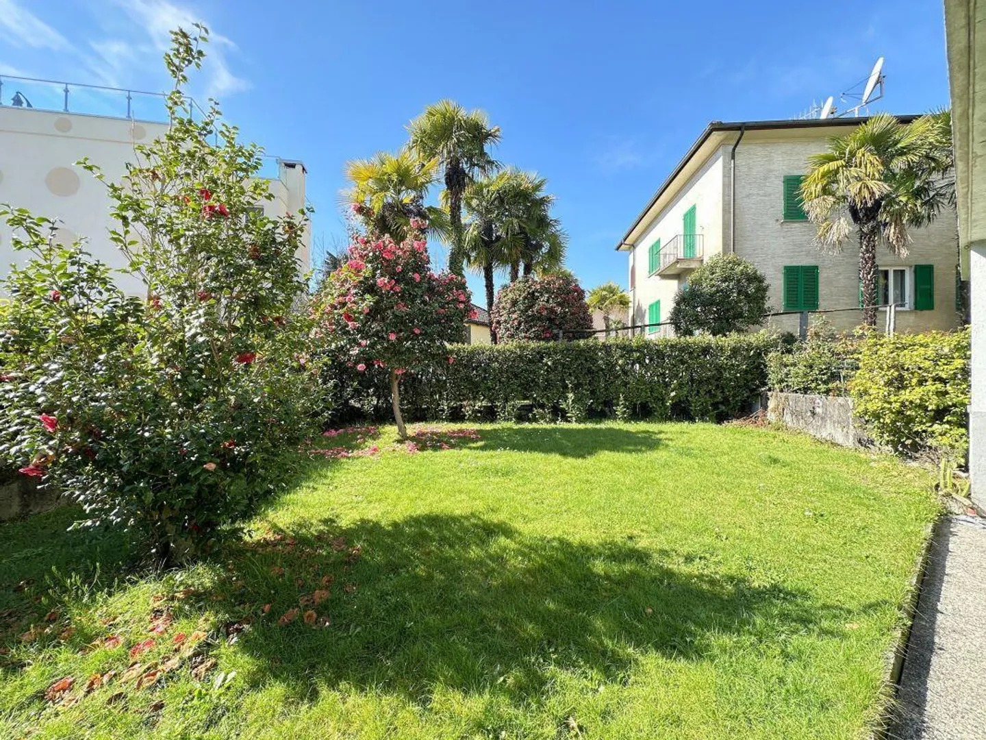 Un pezzo di paradiso nel cuore di Muralto – Appartamento 3.5 locali con giardino - Foto 3 di 11