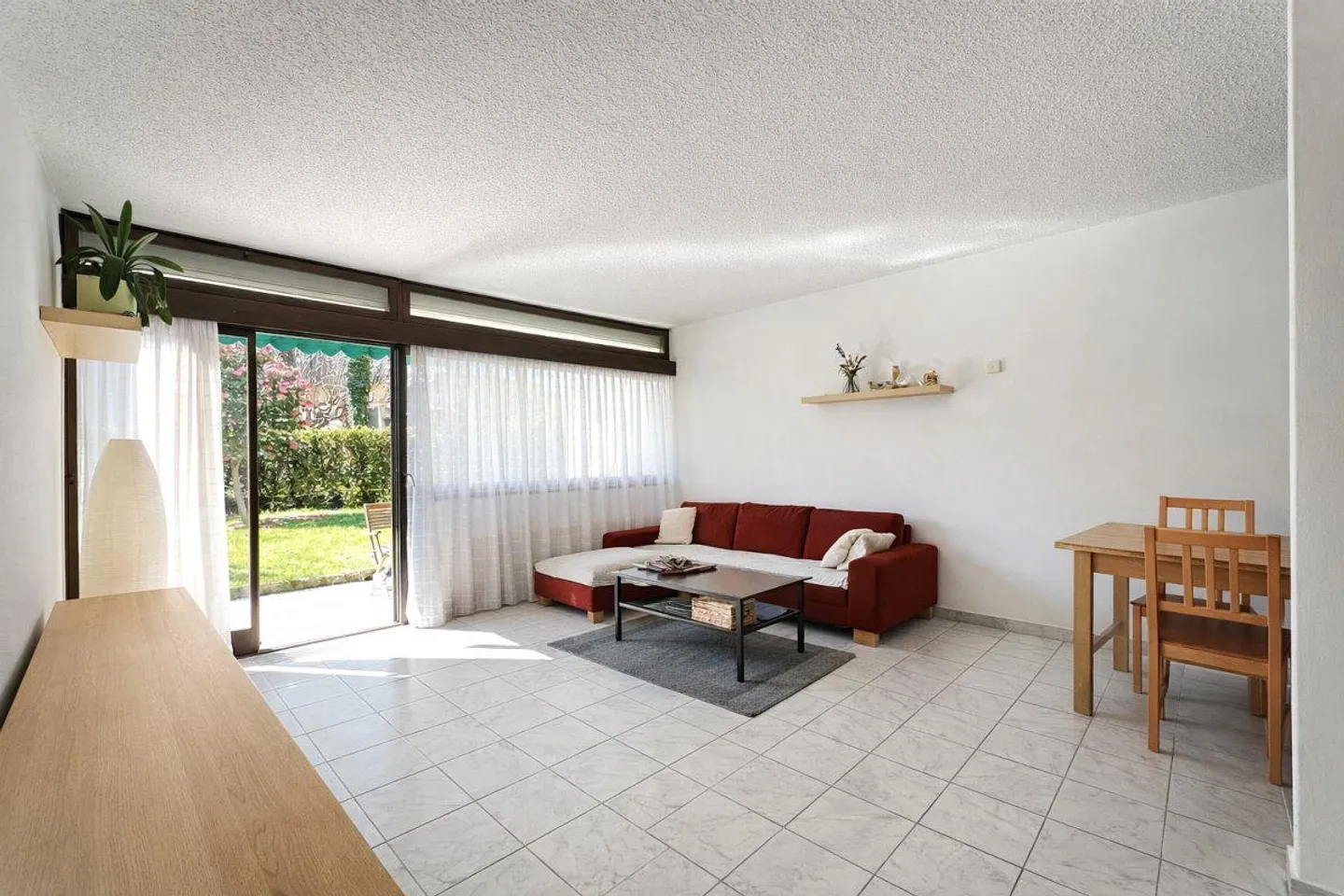 Un pezzo di paradiso nel cuore di Muralto – Appartamento 3.5 locali con giardino - Foto 4 di 11