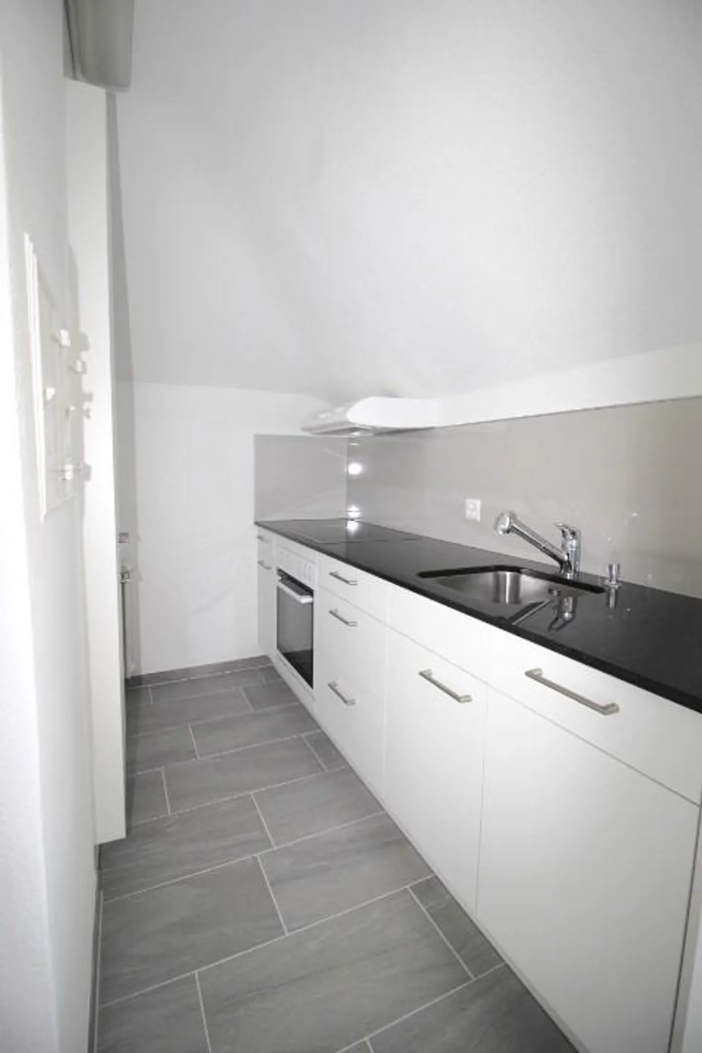 Appartement en duplex de 3,5 pièces - Photo 2 sur 12