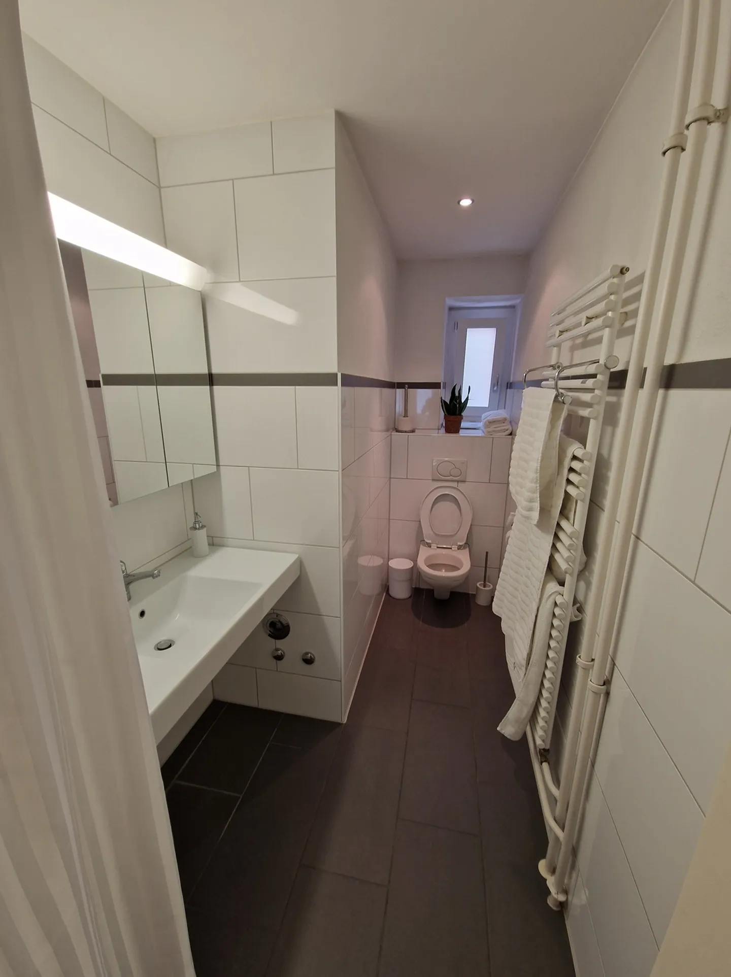 Zentrales Apartment mit modernem Komfort - Foto 8 von 8