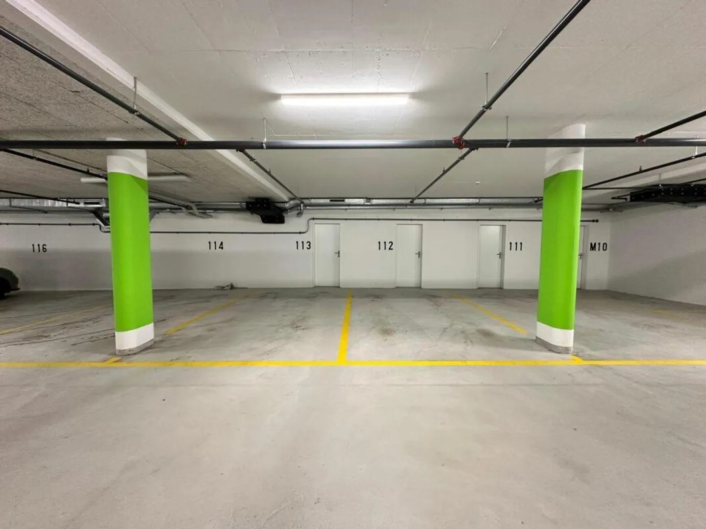 Tiefgaragenparkplätze zu vermieten - Foto 3 von 4