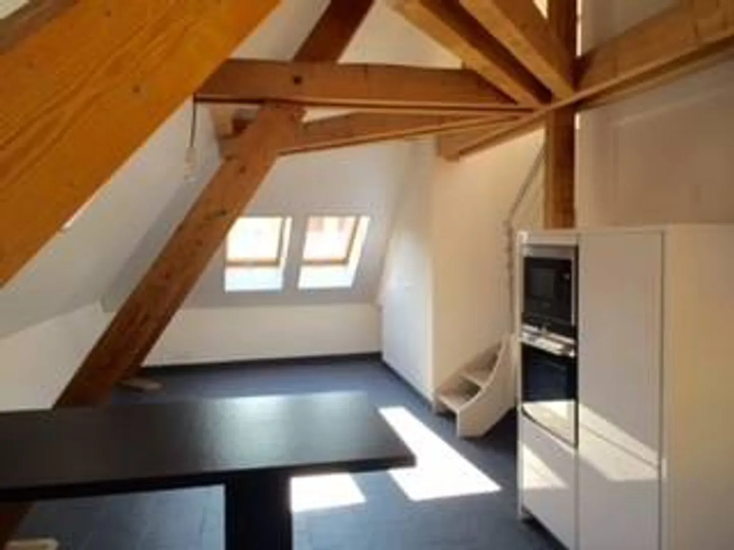 DUPLEX AVEC CHARME AU CENTRE D'AIGLE - Photo 3 sur 7