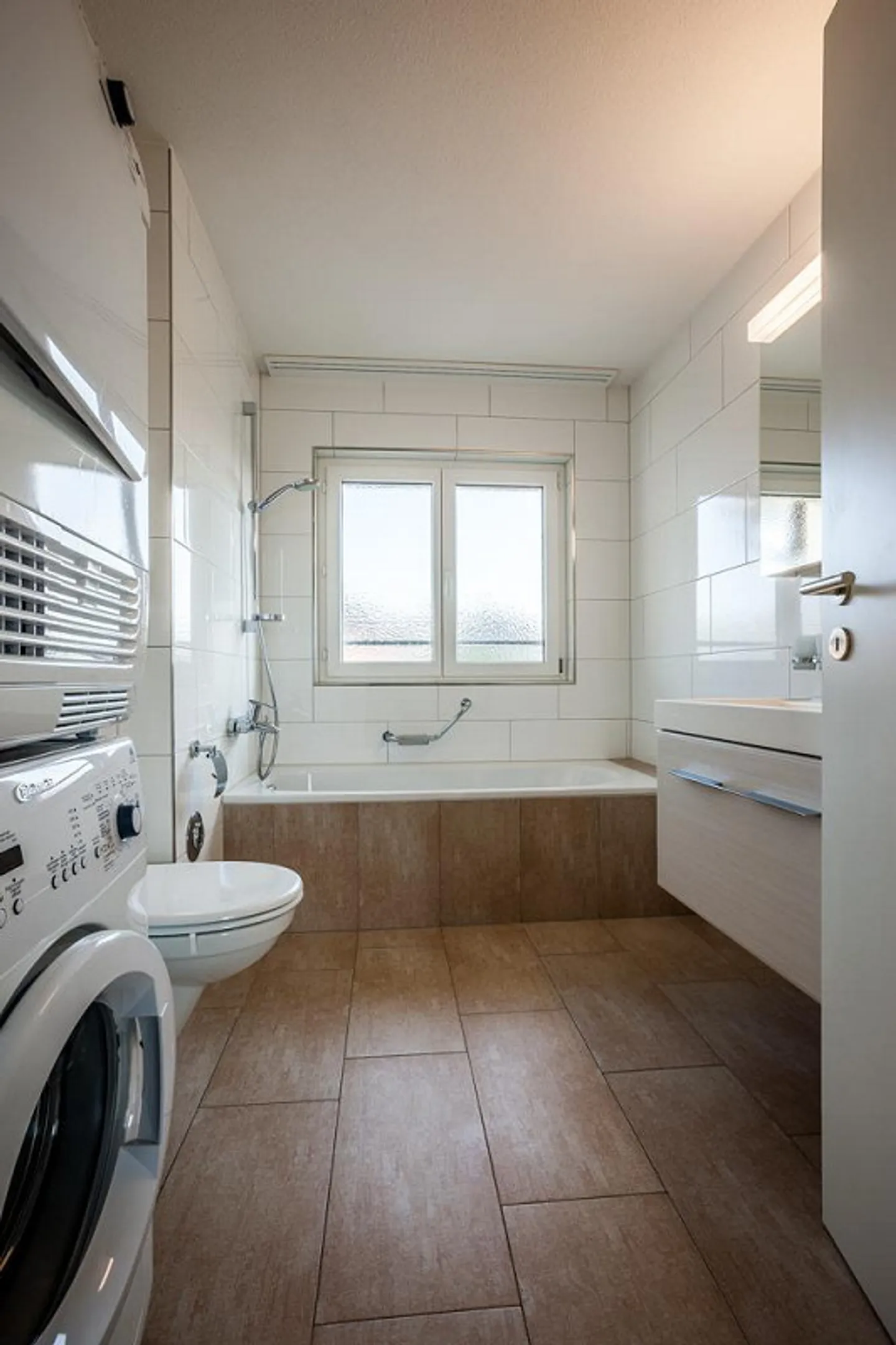 Modern and centrally located living! - Photo 4 of 11