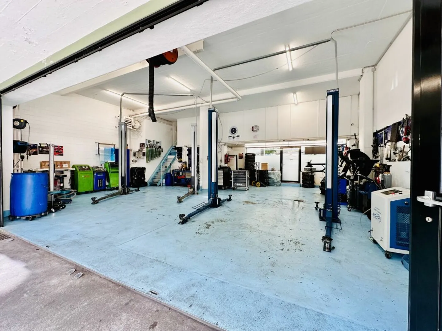 TRADITION GARAGE WITH HEART AND FUTURE - Photo 2 of 6