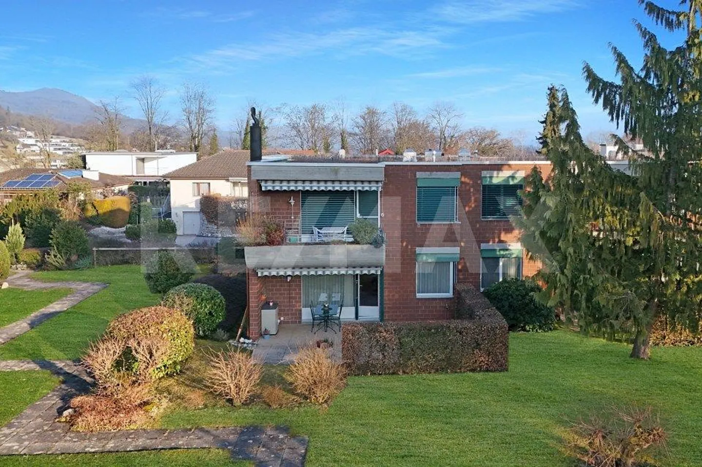 Appartamento giardino 4.5 stanze, 107 m², camino, area di sosta coperta, cantina 20 m², 1 box auto, vicino ai mezzi pubblici - Foto 1 di 13