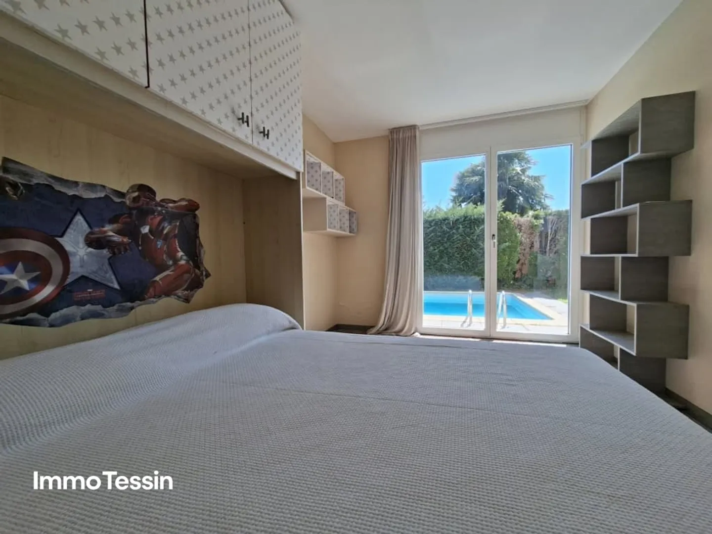 Elegante Villa mit Schwimmbad, Garten und Seesicht auf den Lago di Lugano an sonniger Panoramalage - Foto 12 von 13