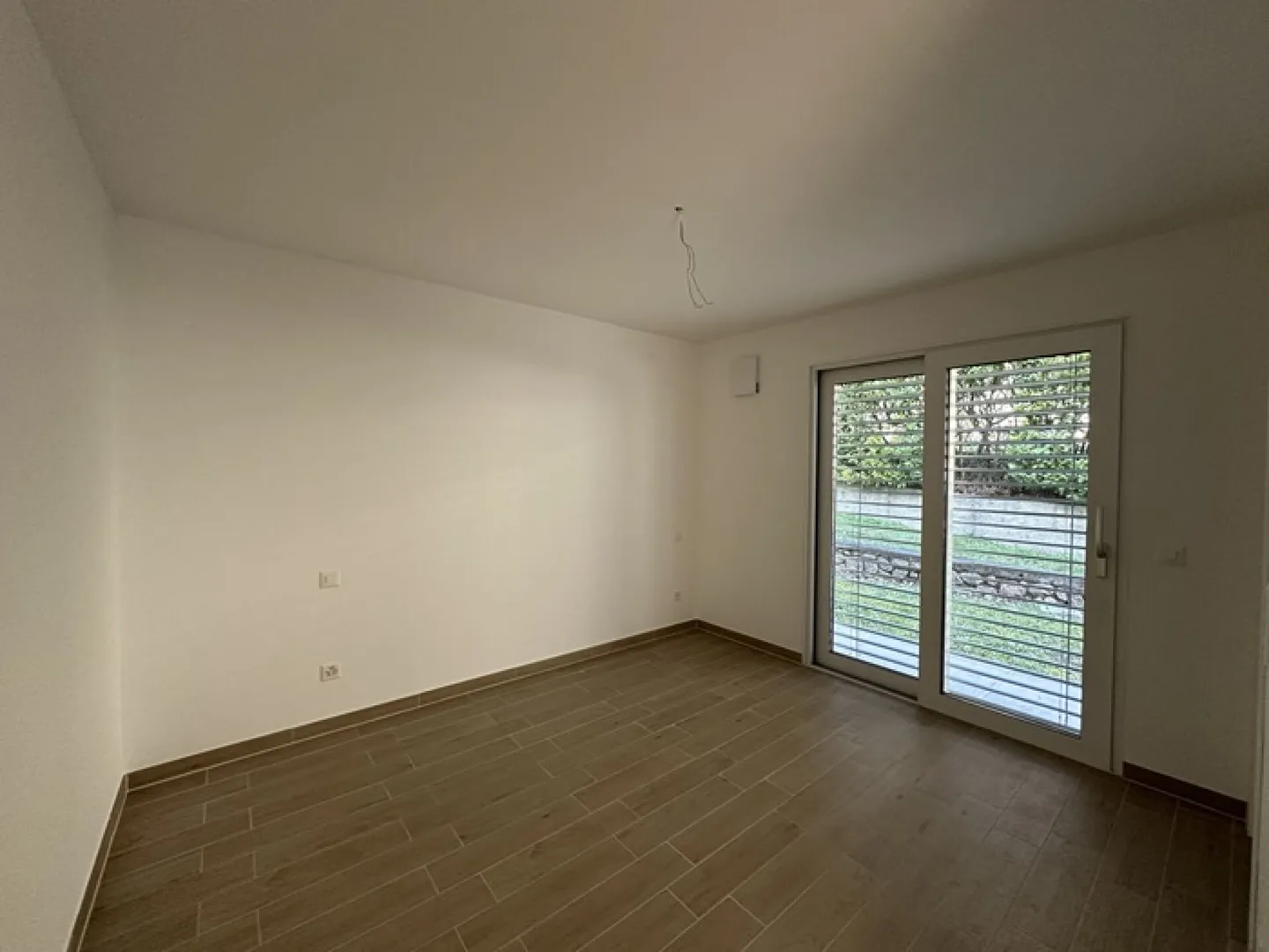 Appartamento moderno e luminoso di 3,5 stanze con giardino privato - Foto 6 di 10