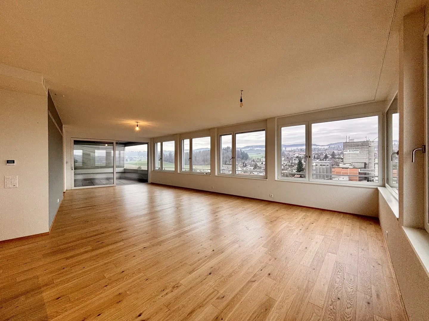 Exklusives Wohnen über den Dächern von Lohn - Foto 3 von 11