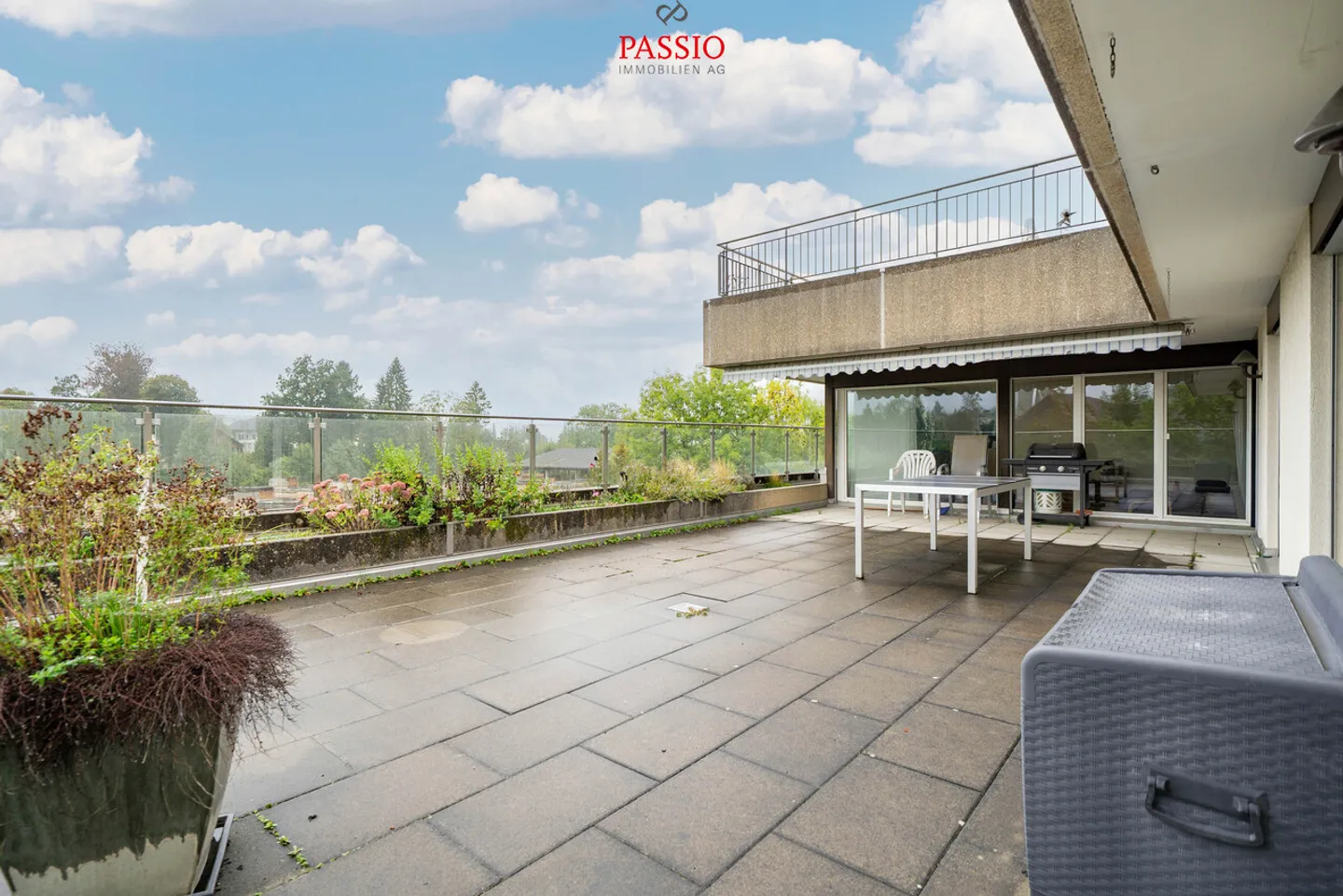 Appartamento con terrazza di 5,5 stanze con giardino e vista panoramica - Foto 1 di 21