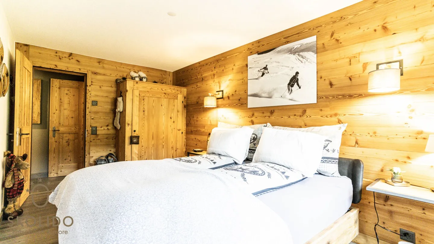 Appartamento ristrutturato di alta qualità con charme alpino in posizione centrale - Foto 8 di 27