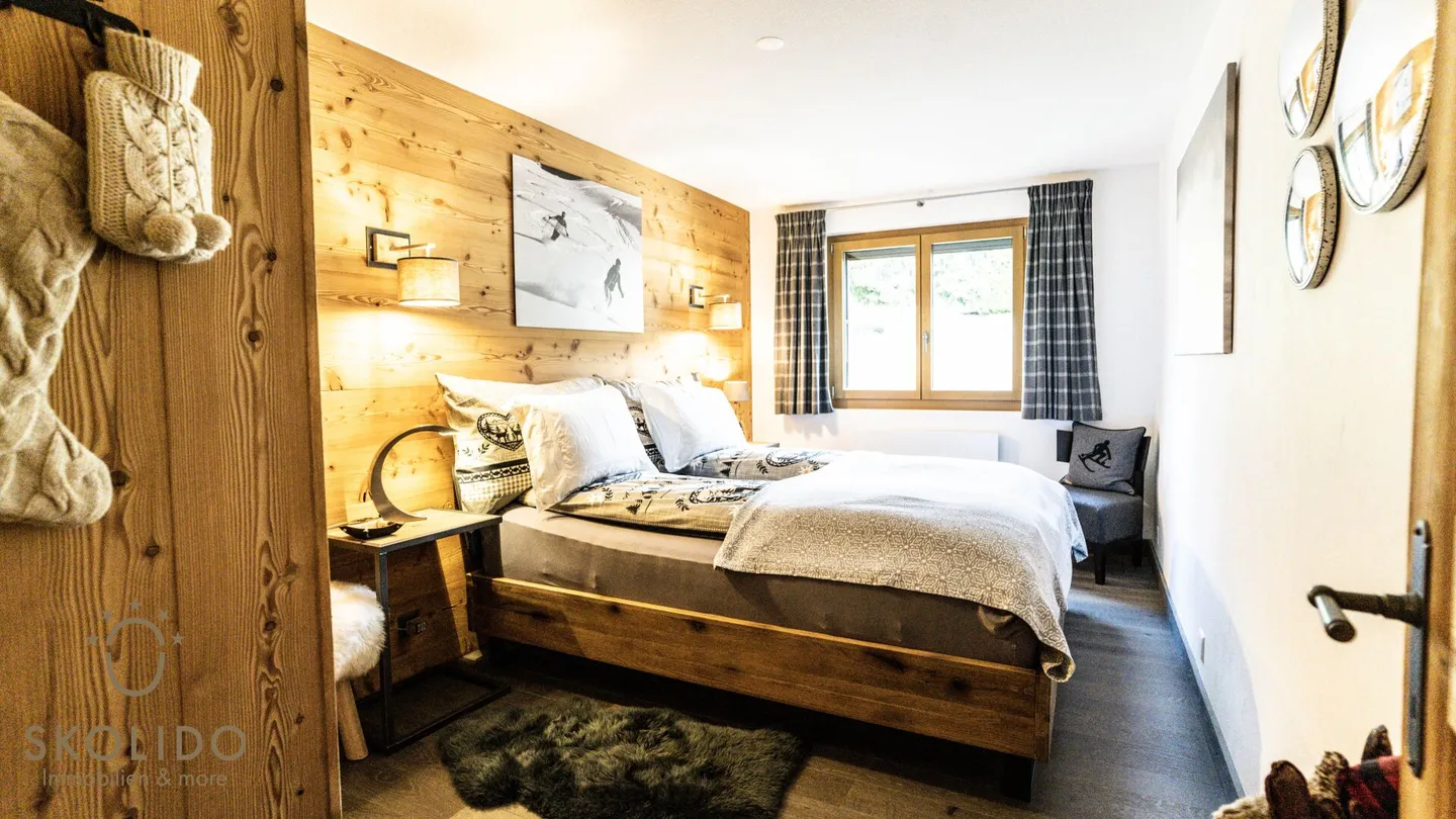 Appartamento ristrutturato di alta qualità con charme alpino in posizione centrale - Foto 9 di 27