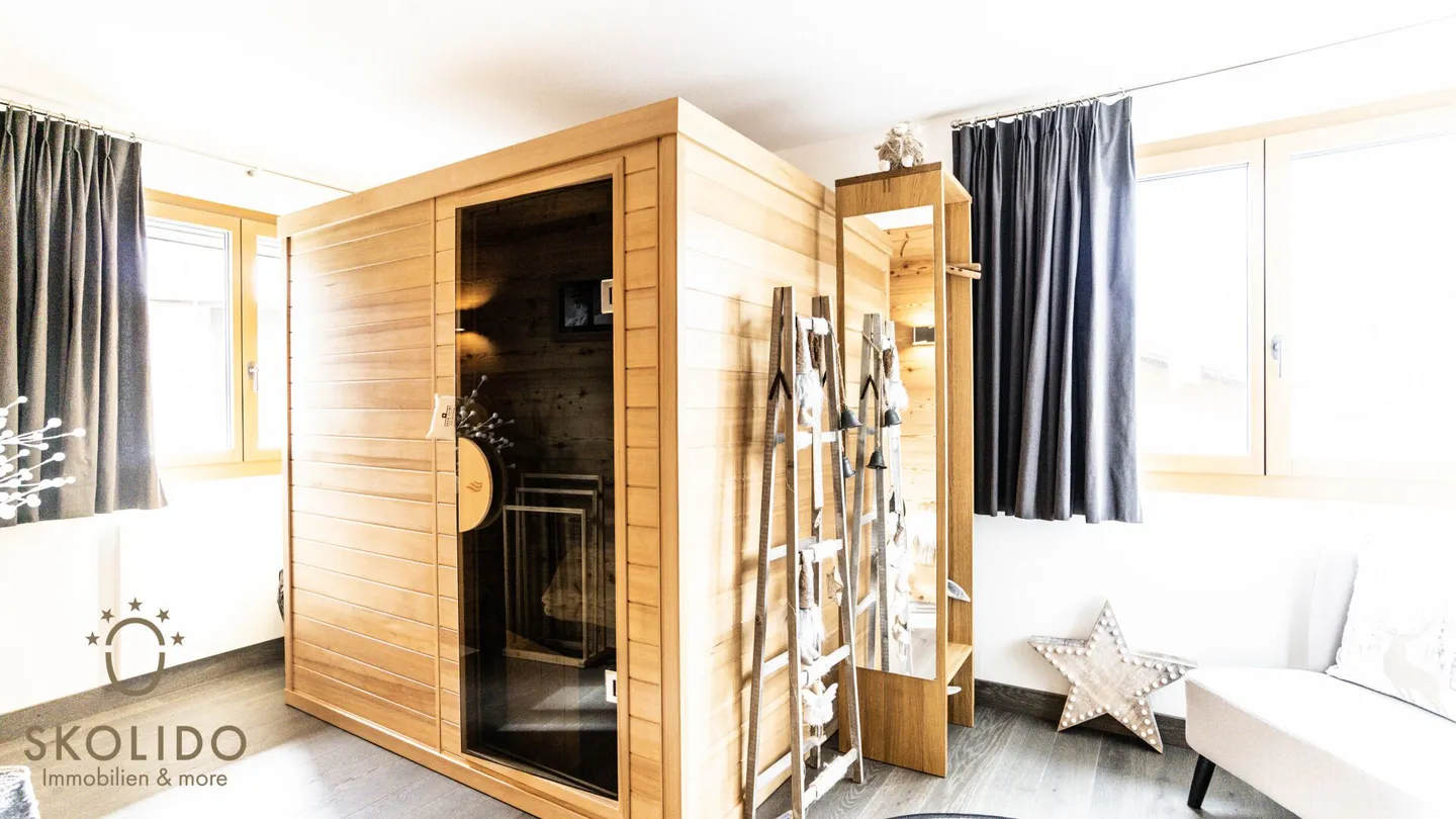 Appartamento ristrutturato di alta qualità con charme alpino in posizione centrale - Foto 12 di 27