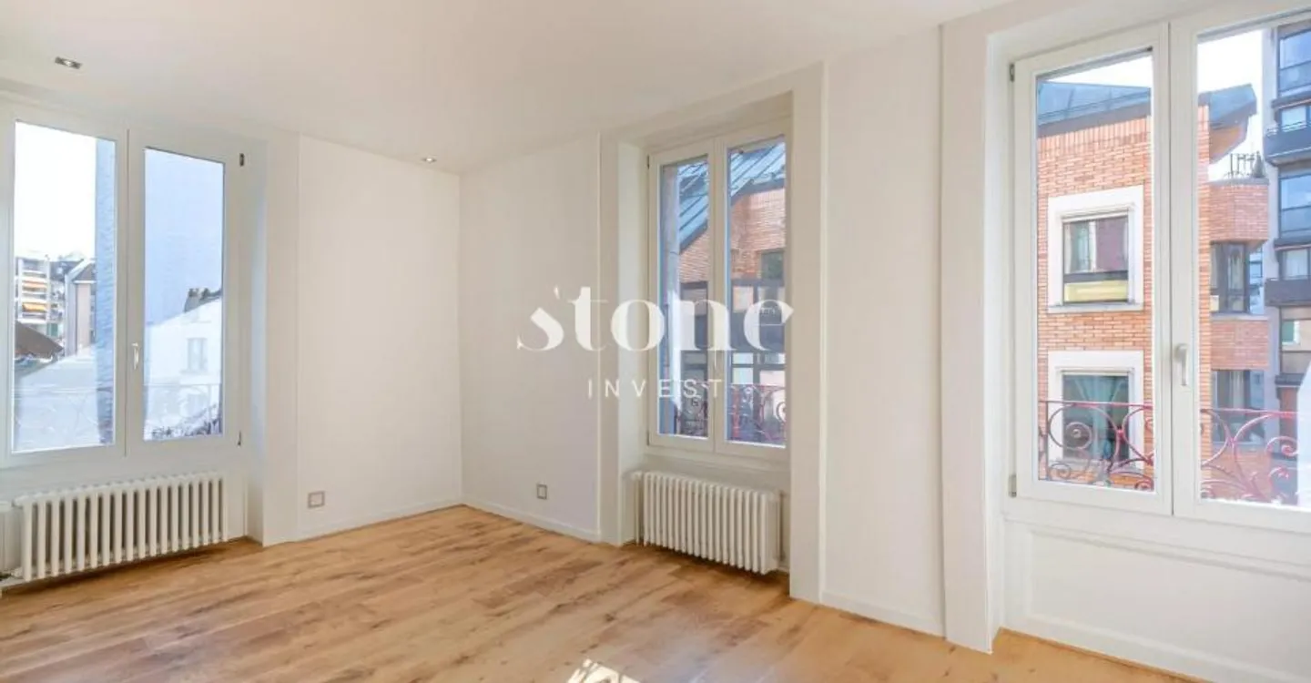 In the heart of Eaux-Vives! Superb duplex with terrace - Photo 4 of 12