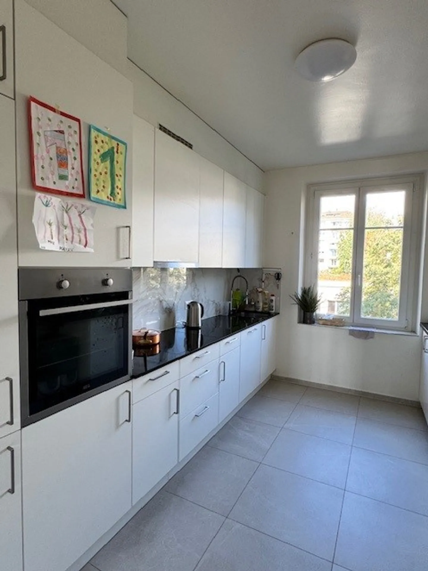 Appartement 4 pièces - Photo 2 sur 6